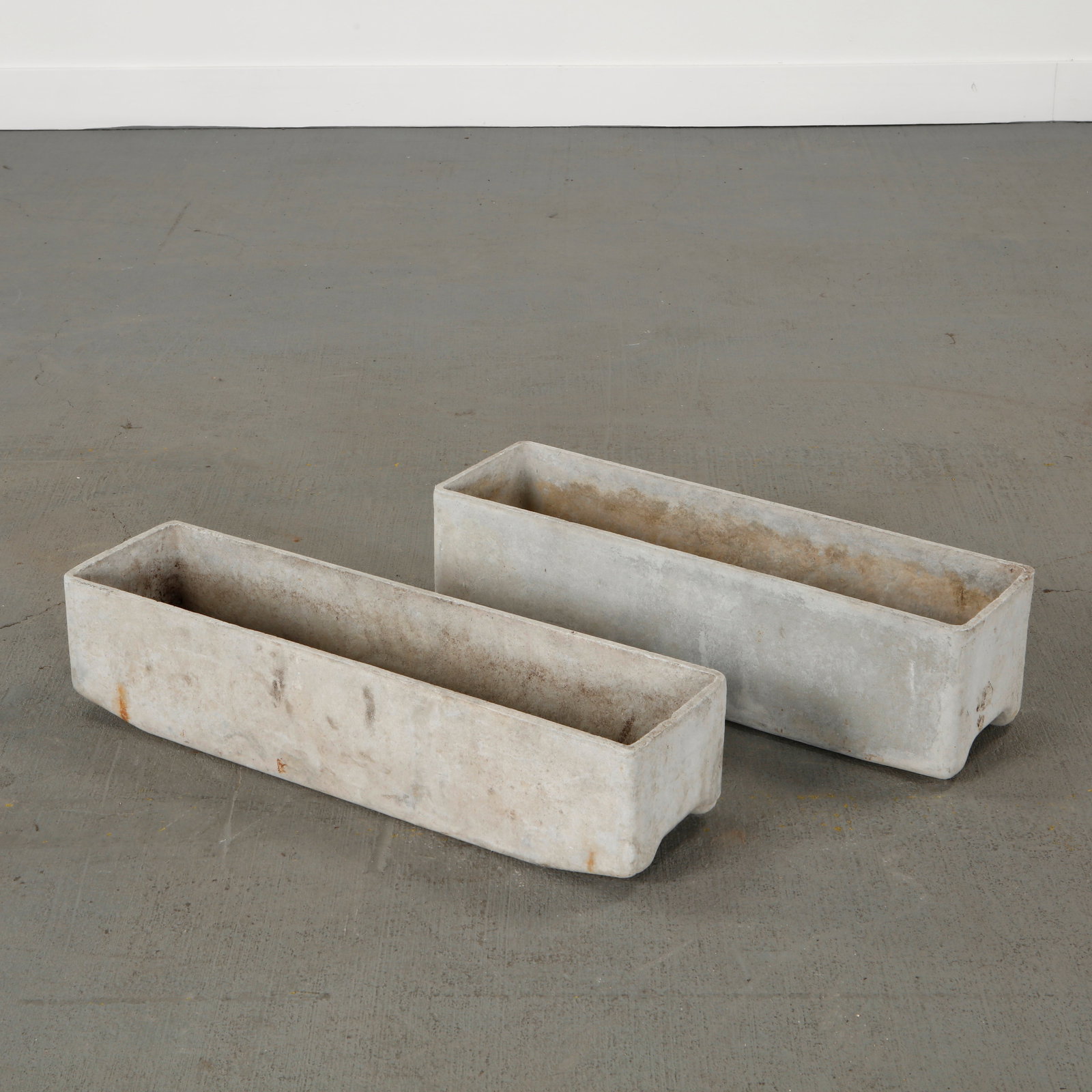 Willy Guhl, Pair of Rectangular Planters, 1960s: Classic rectangular Eternit planters designed by Willy Guhl. Timeless Swiss design with natural patina from outdoor use. Height: 7 in. Length: 24 in. Width: 6.5 in. 2: Height: 6 in. Length: 26 in. Wid