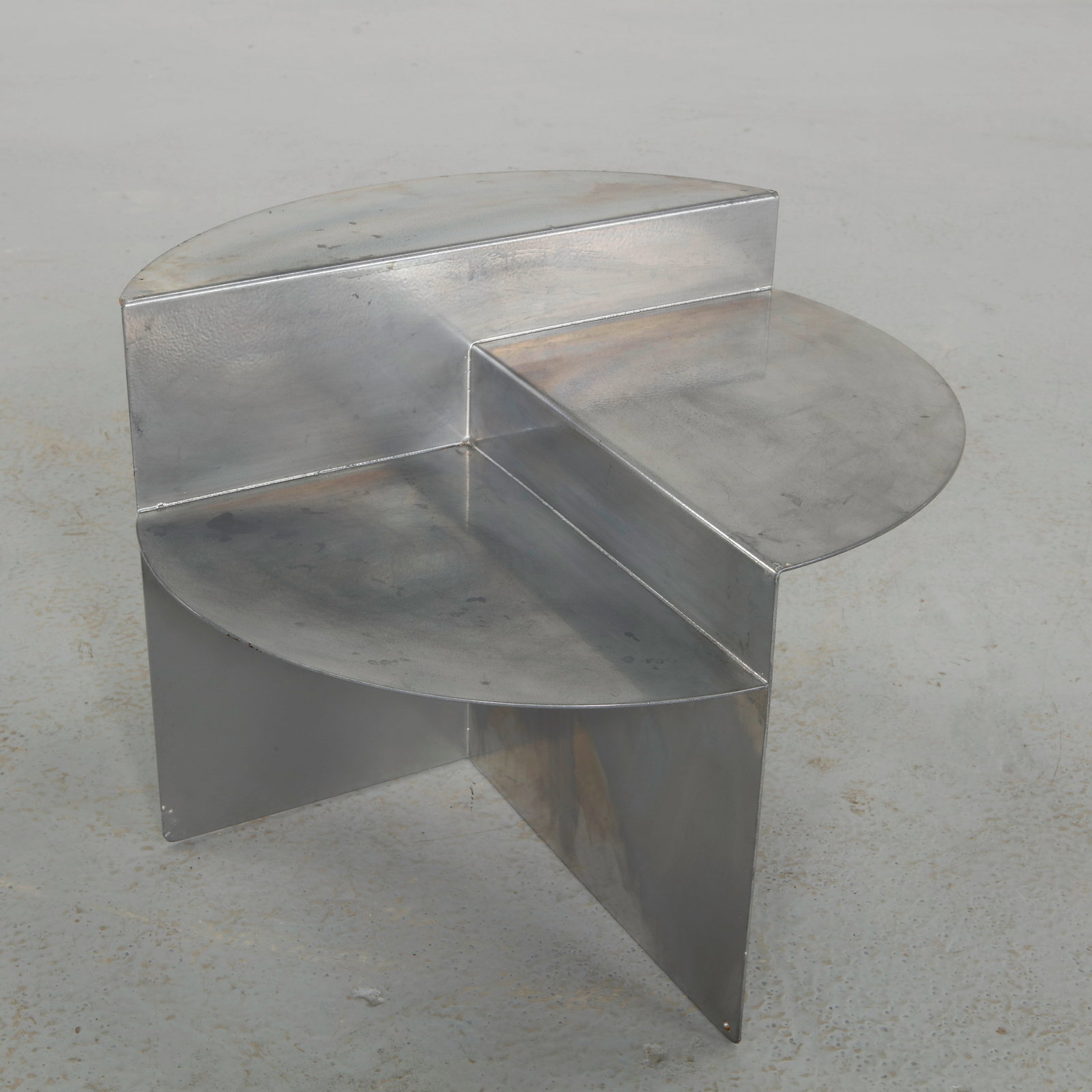 Jonas Trampedach for Frama, Rivet Side Table, 2011: Executed in raw aluminum with riveted construction, this side table reflects Trampedach minimalist and industrial sensibility. The precise geometry and visible assembly highlight a contemporary