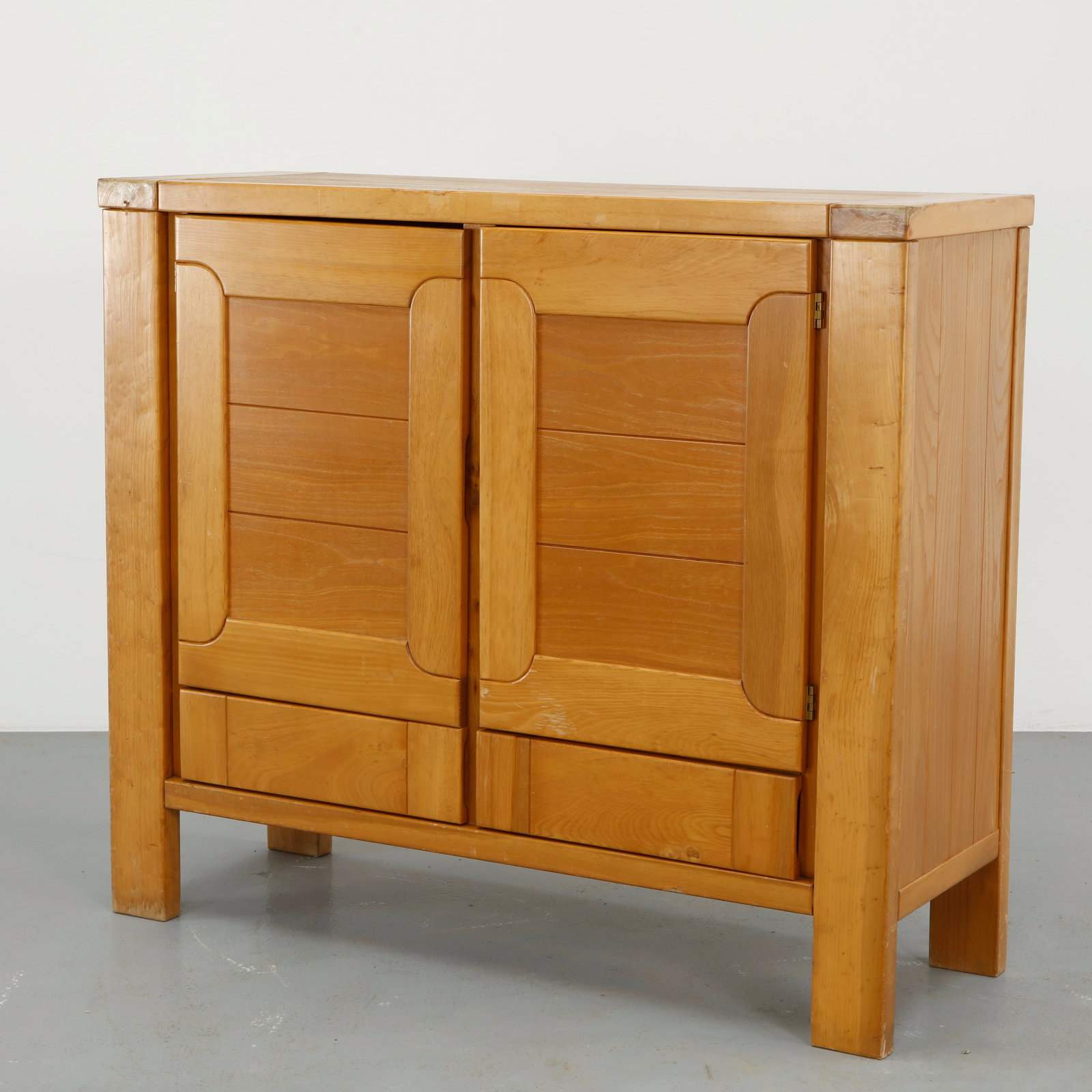 Roland Haeusler for Maison Regain, Elm Sideboard, 1960s: Sideboard executed in solid elm, featuring refined joinery and softly contoured handles. A rare example of Maison Regain craftsmanship, emphasizing material integrity and understated elegance.