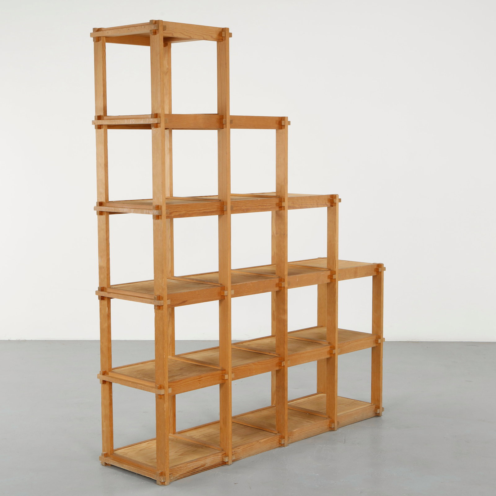 Pierre Gauthier Delay, Geometric Pine Shelf, 1960s: Crafted in pine, this modular shelving unit features a grid like construction with precise joinery. The balanced proportions and clarity of structure reflect Delaye approach to functional design. A