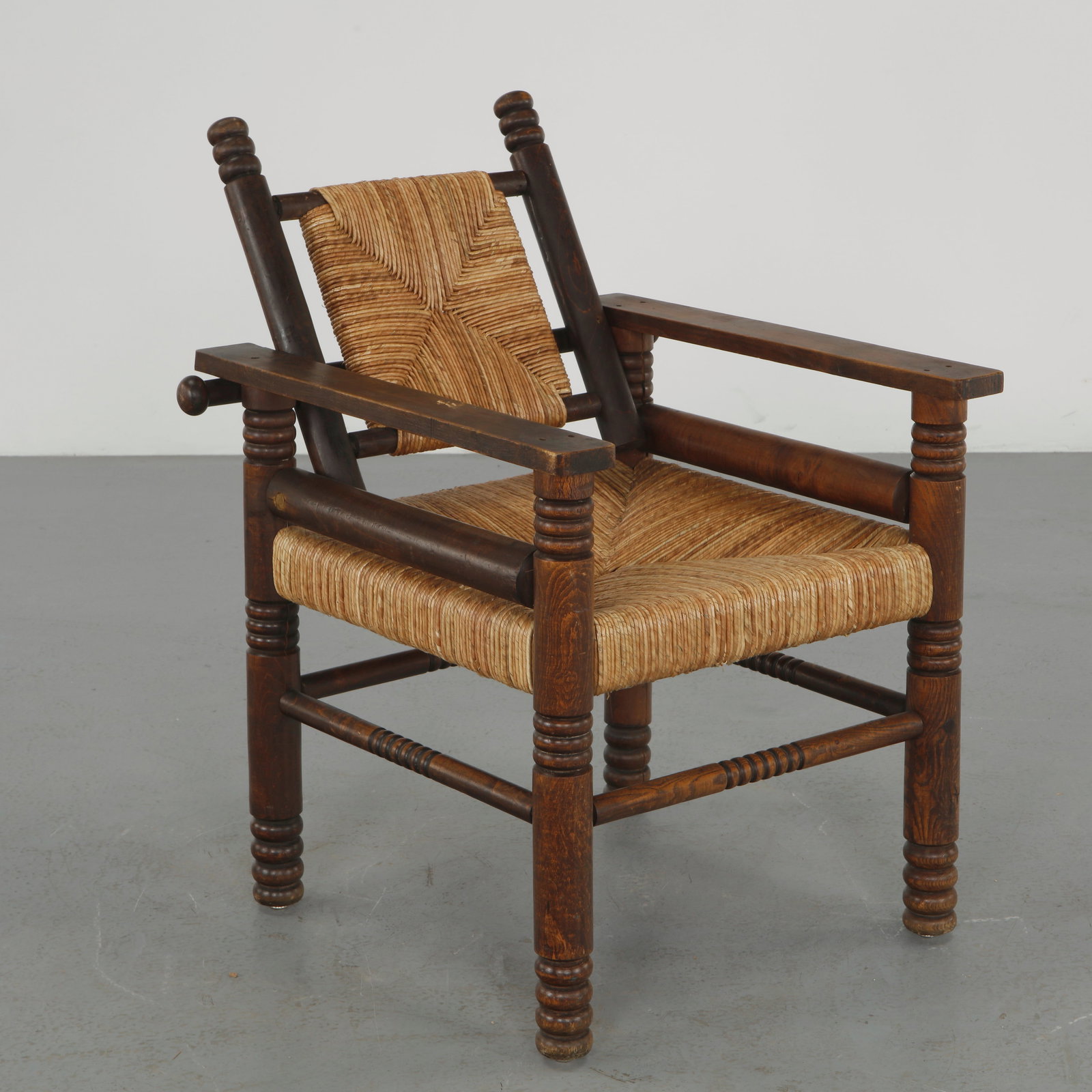 Adrien Audoux and Frida Minet, Rope and Wood Armchair, France, 1960s: Crafted in solid wood with hand woven rope seat and back, this armchair embodies the rustic refinement of Audoux Minet. The turned elements and balanced proportions highlight traditional