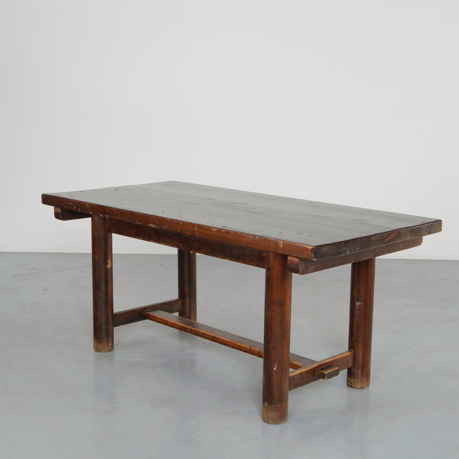 George Robert, Solid Wood Table, 1960s: Solid wood table by George Robert featuring a thick rectangular top supported by cylindrical legs. The warm tone and subtle patina emphasize the material integrity and restrained modernist