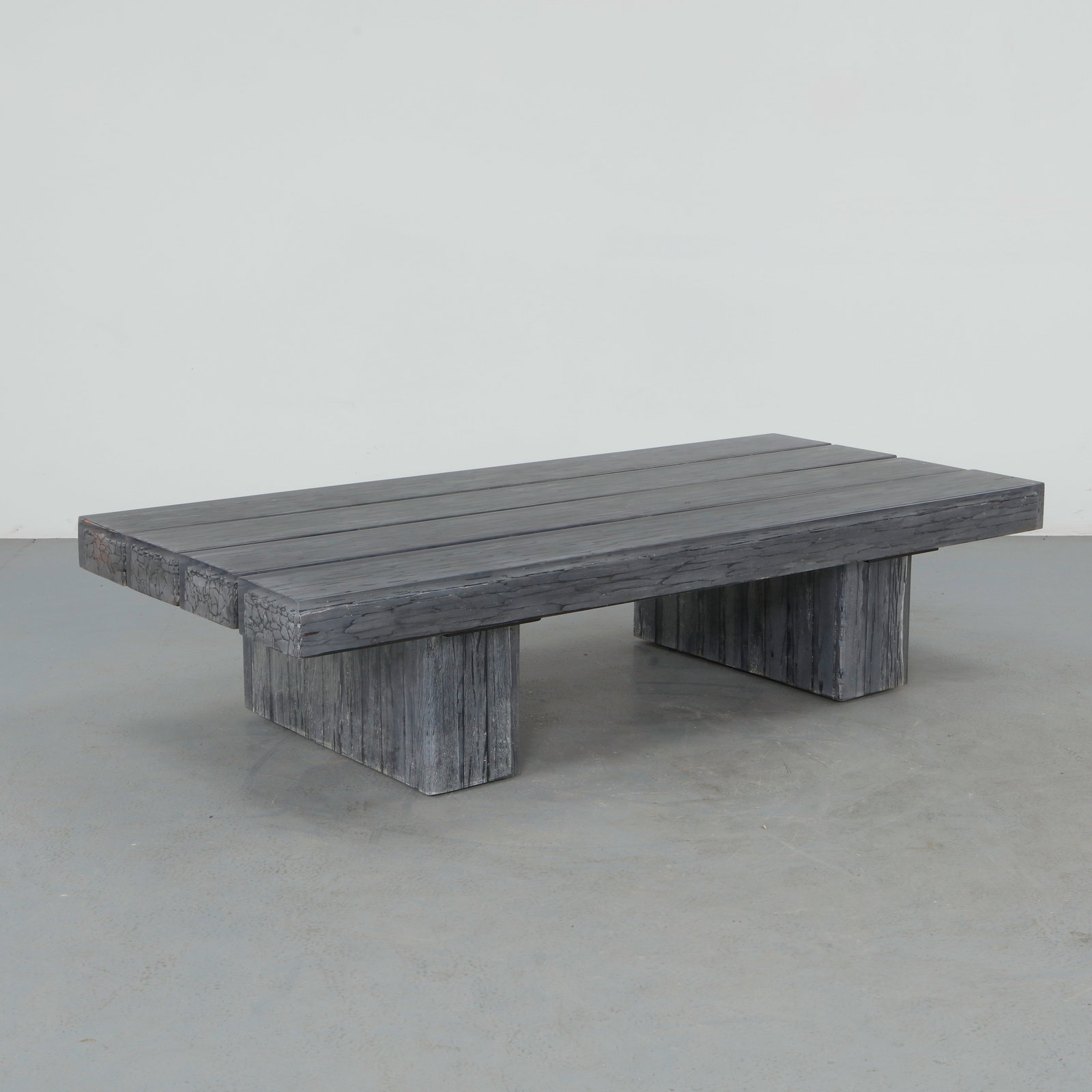 Timothy Oulton, Glacier Coffee Table: Crafted with a thick textured surface evoking carved ice, resting on block supports, emphasizing material presence and sculptural mass. A bold contemporary statement piece. Height: 17 in. Length: 71 i