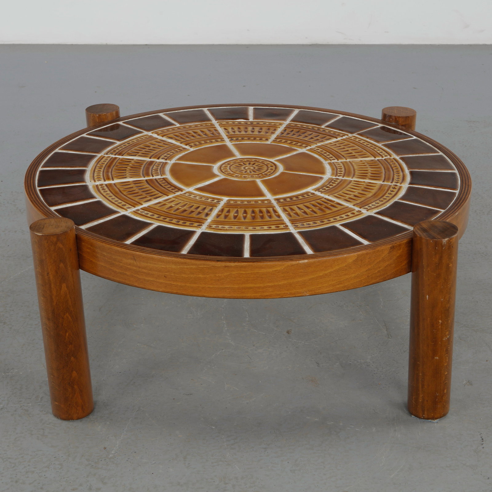 Roger Capron, Ceramic Round Coffee Table, 1960s: Vintage round coffee table by Roger Capron, showcasing his signature ceramic tile work with intricate natural motifs. Height: 13 in. Diameter: 35.5 in.