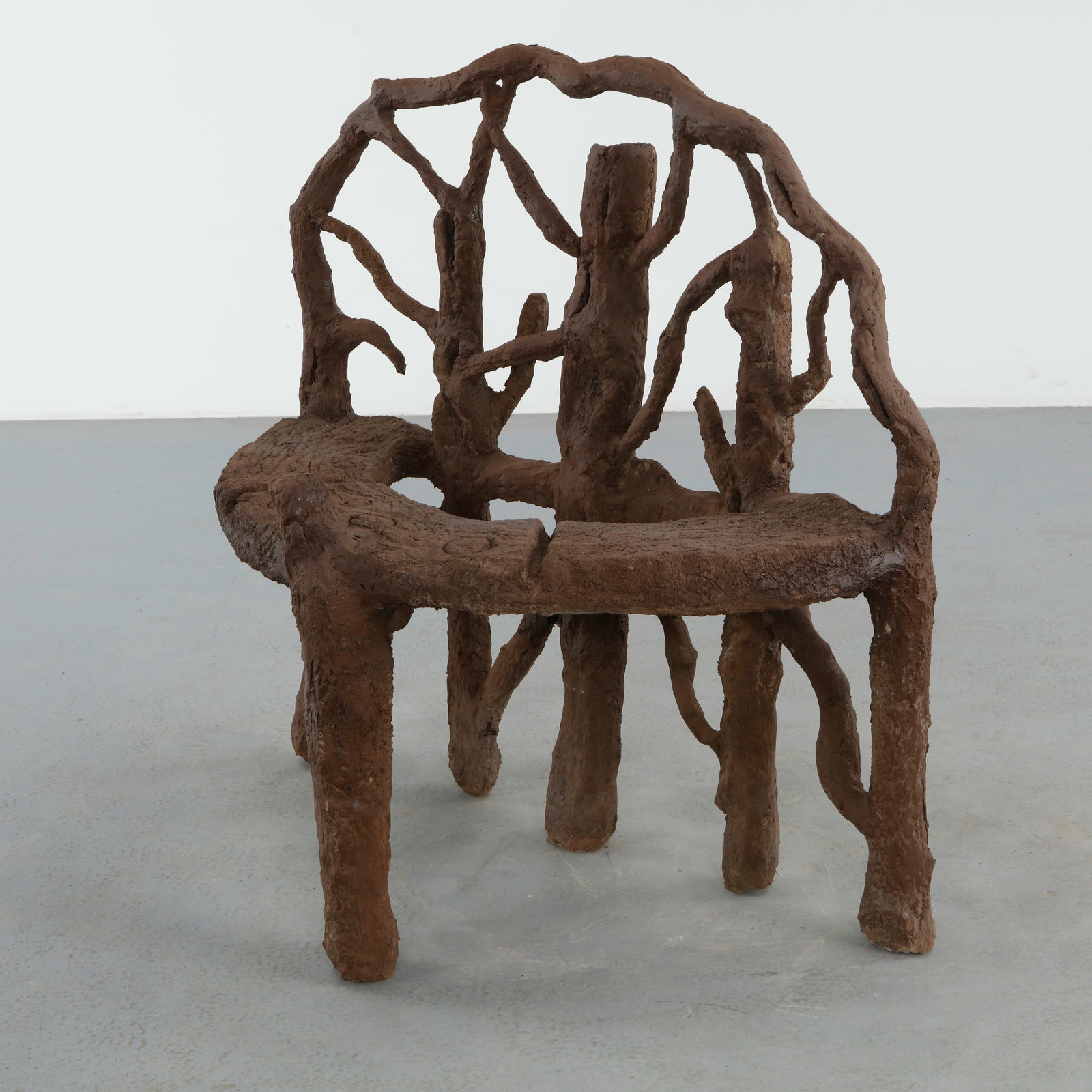 Organic Faux Bois Bench: Organic faux bois bench featuring an openwork branch form backrest and sculpted naturalistic texture. The expressive handcrafted construction captures the romantic character of rustic French garden fu