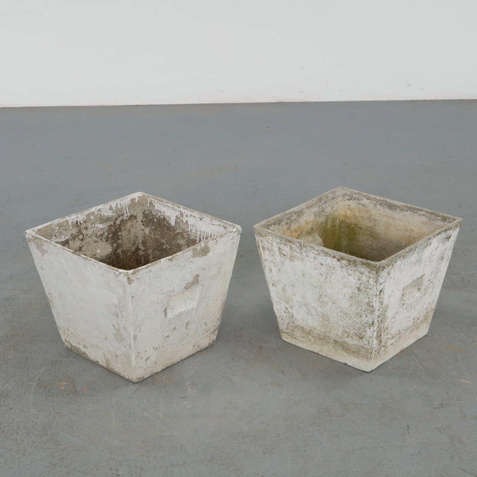 Willy Guhl, Pair of Graduated Square Planters, 1960s: Graduated square Eternit planters designed by Willy Guhl. Timeless Swiss design with natural patina from outdoor use. Height: 12 in. Length: 13.5 in. Width: 13.5 in.
