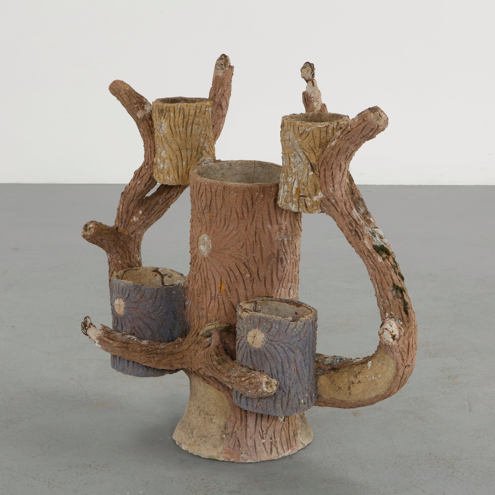Faux Bois Sculptural Tree 5-Pot Planter, 1960s: Executed in cast concrete with a faux bois finish, this sculptural ensemble evokes natural tree forms through hand worked textures and organic contours. The composition integrates multiple vessels wit
