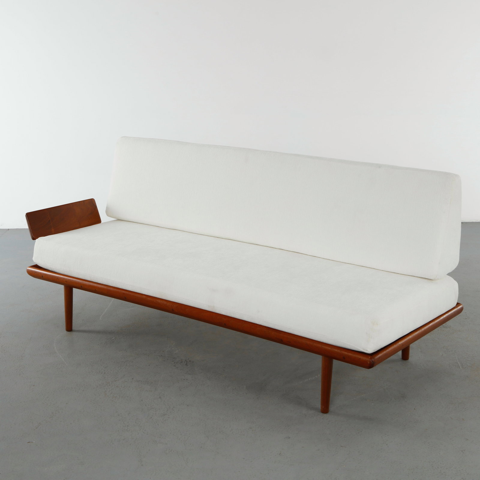 Peter Hvidt & Orla Molgaard Nielsen for France & Son, Minerva Sofa Daybed, 1960s: Crafted with a solid teak frame and refined joinery, retaining its clean architectural lines and generous upholstered seat. A versatile design emblematic of Danish modern functionalism. Height: 33.5 i