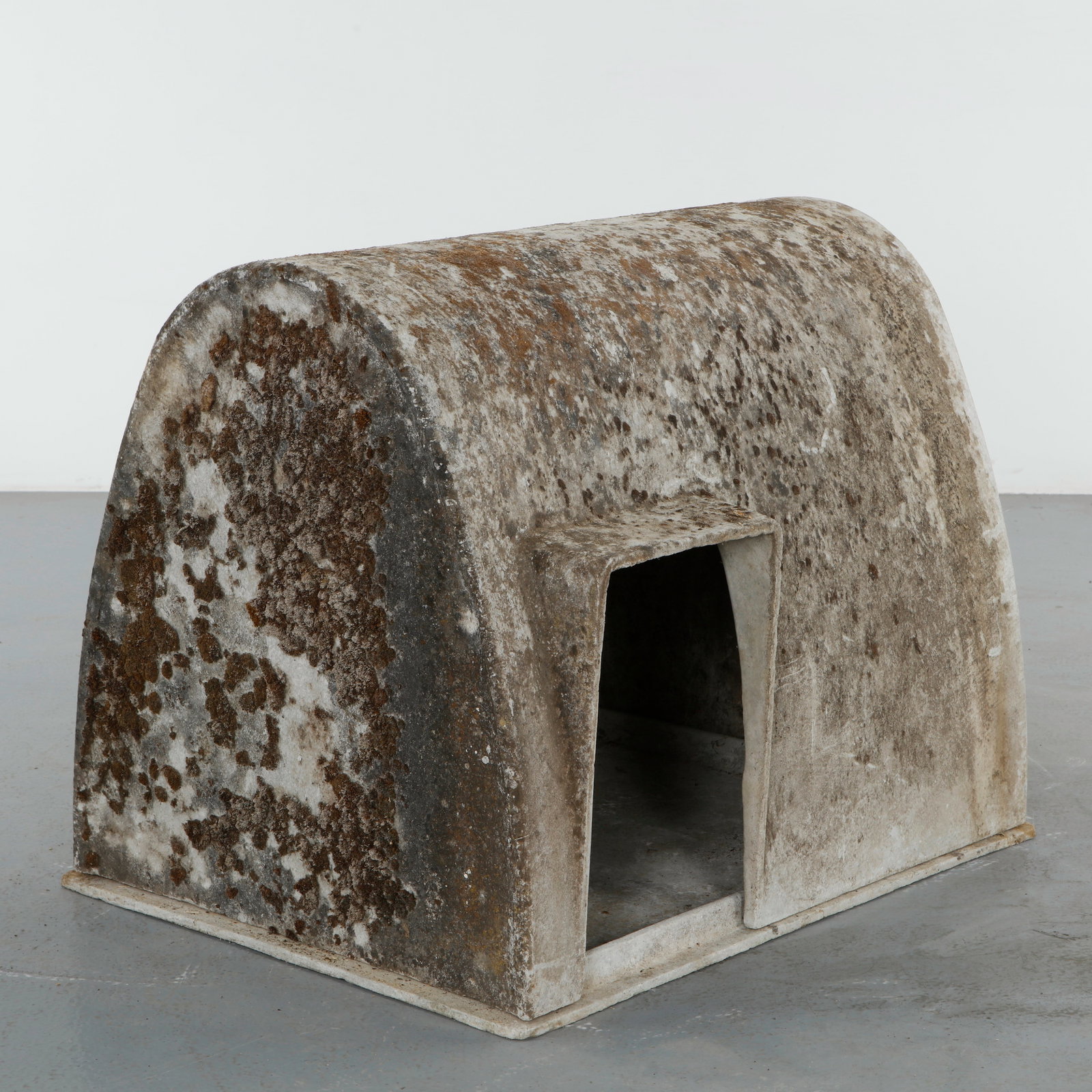 Willy Guhl, Dog House, 1960s: A rare sculptural dog house executed in fiber cement, by Willy Guhl. The monolithic form and softened curves reflect the designerâ€™s architectural approach to utilitarian objects. A