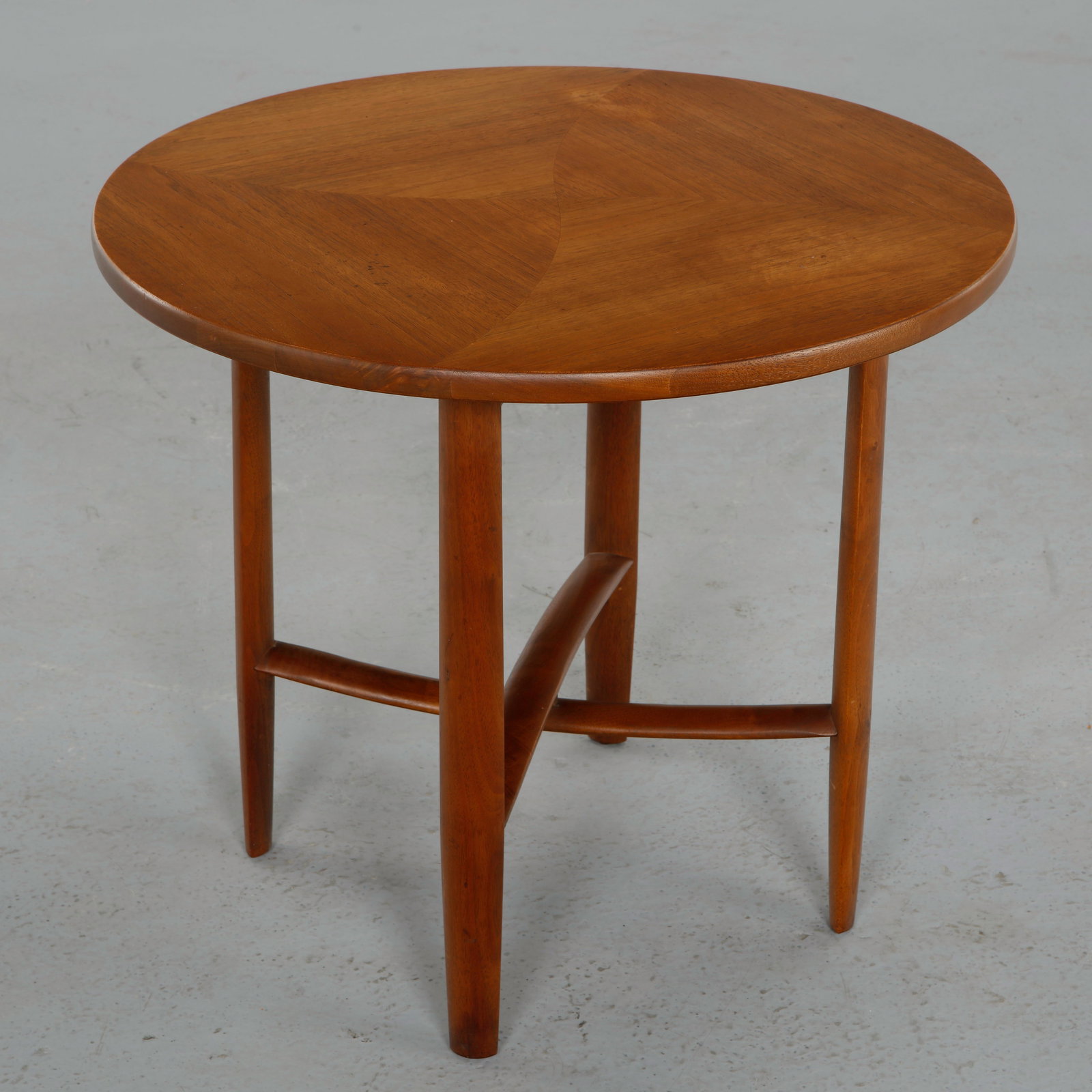 Barney Flagg for Drexel, Parallel Side Table, 1960s: Crafted in walnut, this side table features a round top with subtle grain variation supported by a structured base with clean intersecting lines. The restrained geometry reflects Barney Flagg architec