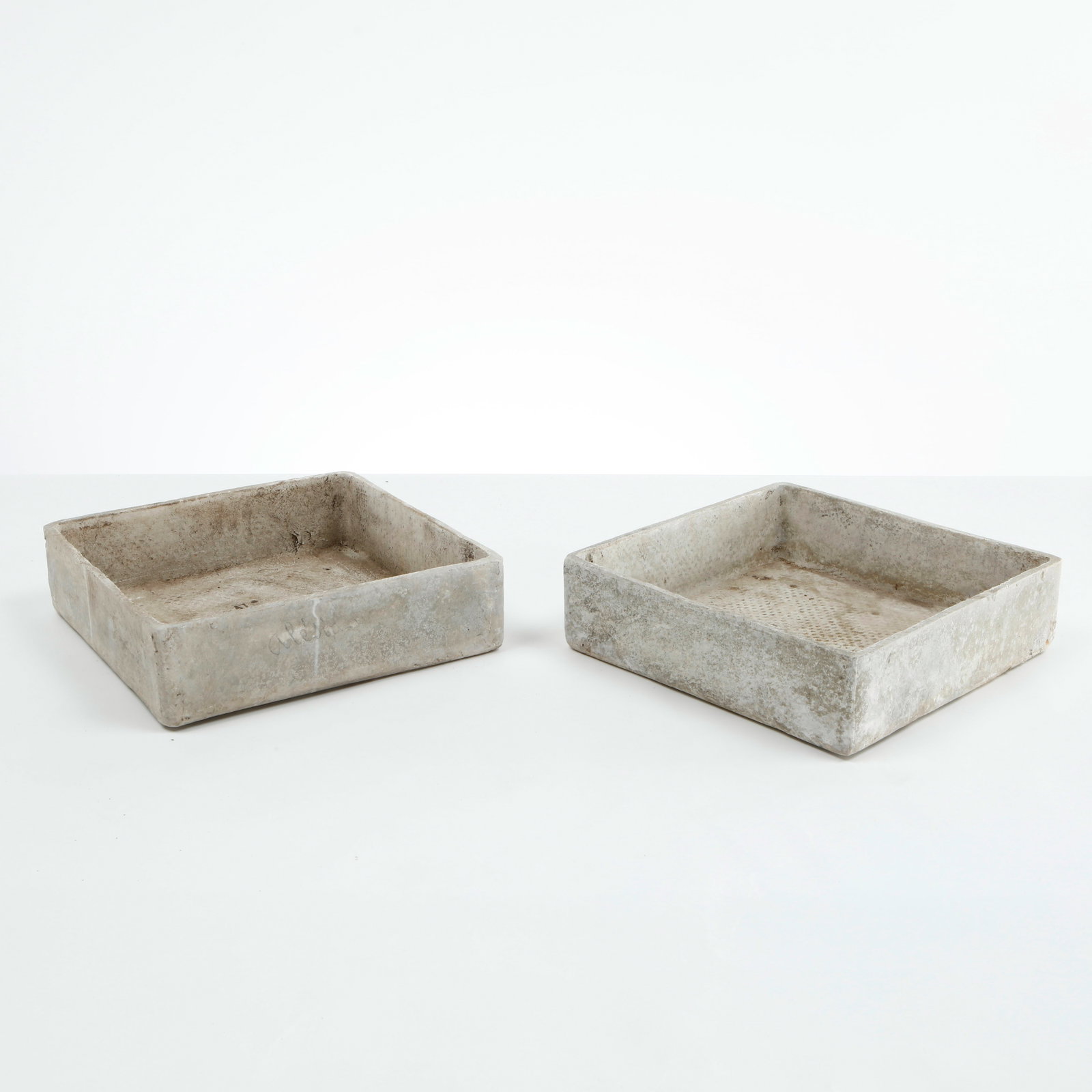 Willy Guhl, Pair of Square Trait Planters, 1960s: Rare pair of square Eternit planters designed by Willy Guhl, executed in fiber cement with clean geometric proportions and softened edges. Their restrained architectural form and naturally weathered