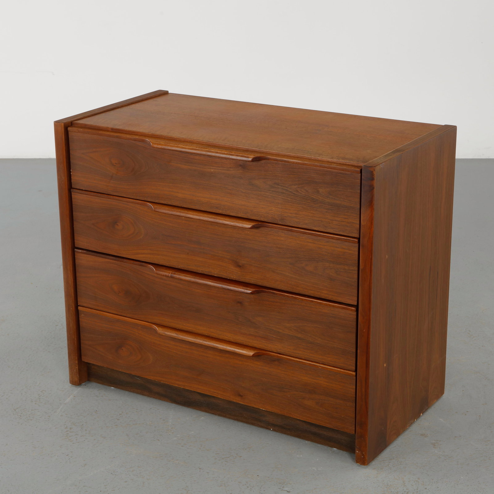 Barzilay, Walnut Dresser, 1960s: Crafted in richly grained walnut, featuring a clean rectilinear case with integrated pulls. The balanced proportions and refined joinery exemplify the understated elegance of American modern design. H
