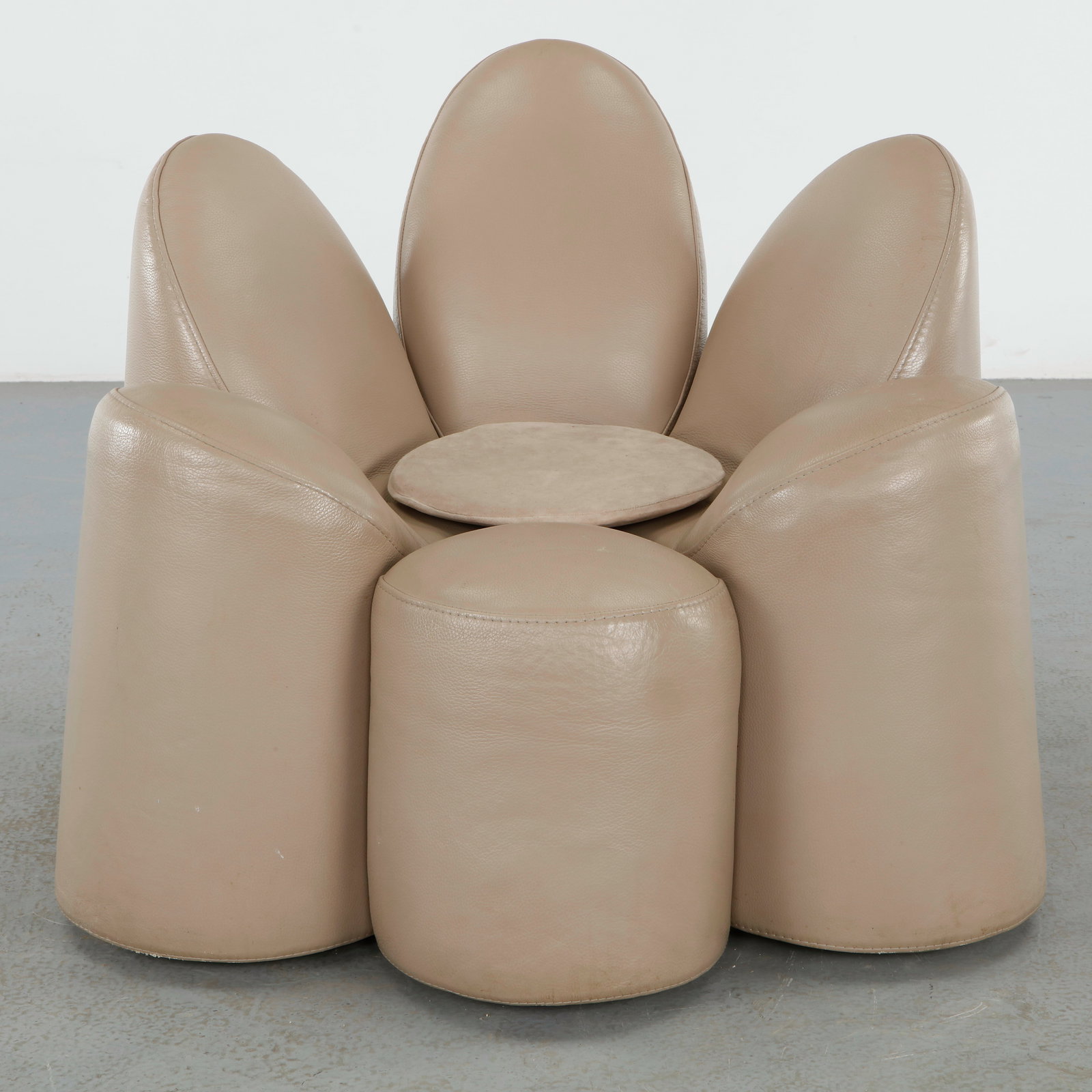 Fabrice Berrux for Roche Bobois, Mayflower Leather Armchair, 2000s: Composed of petals like upholstered elements in supple leather forming an enveloping sculptural seat. The playful organic silhouette reflects contemporary French design innovation. Height: 32 in. Widt