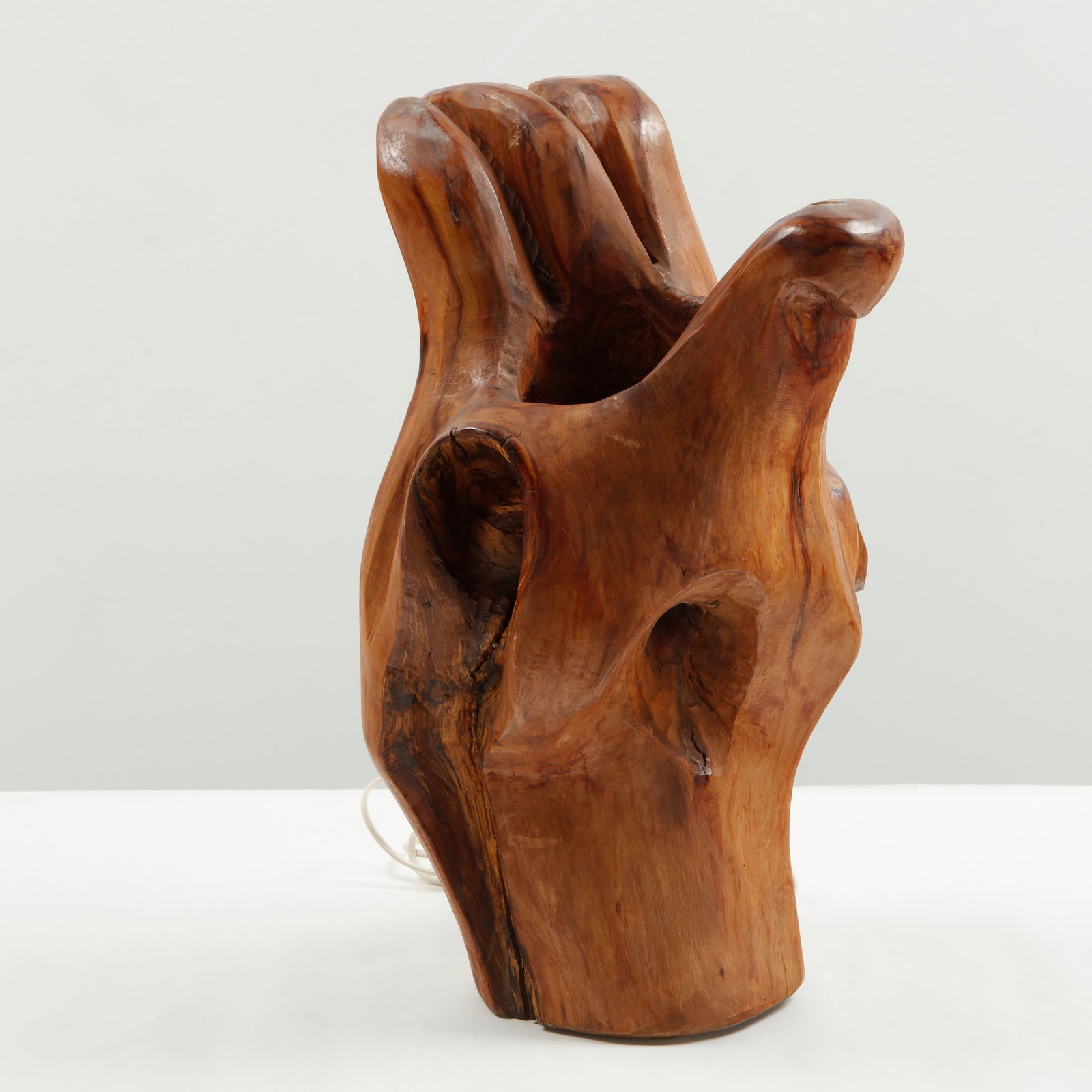 Scuptural Root Desk Lamp, 1960s: Carved from a single section of natural root wood, featuring an expressive organic form shaped by the grain and natural voids. The sculptural silhouette reflects the mid-century fascination with raw m