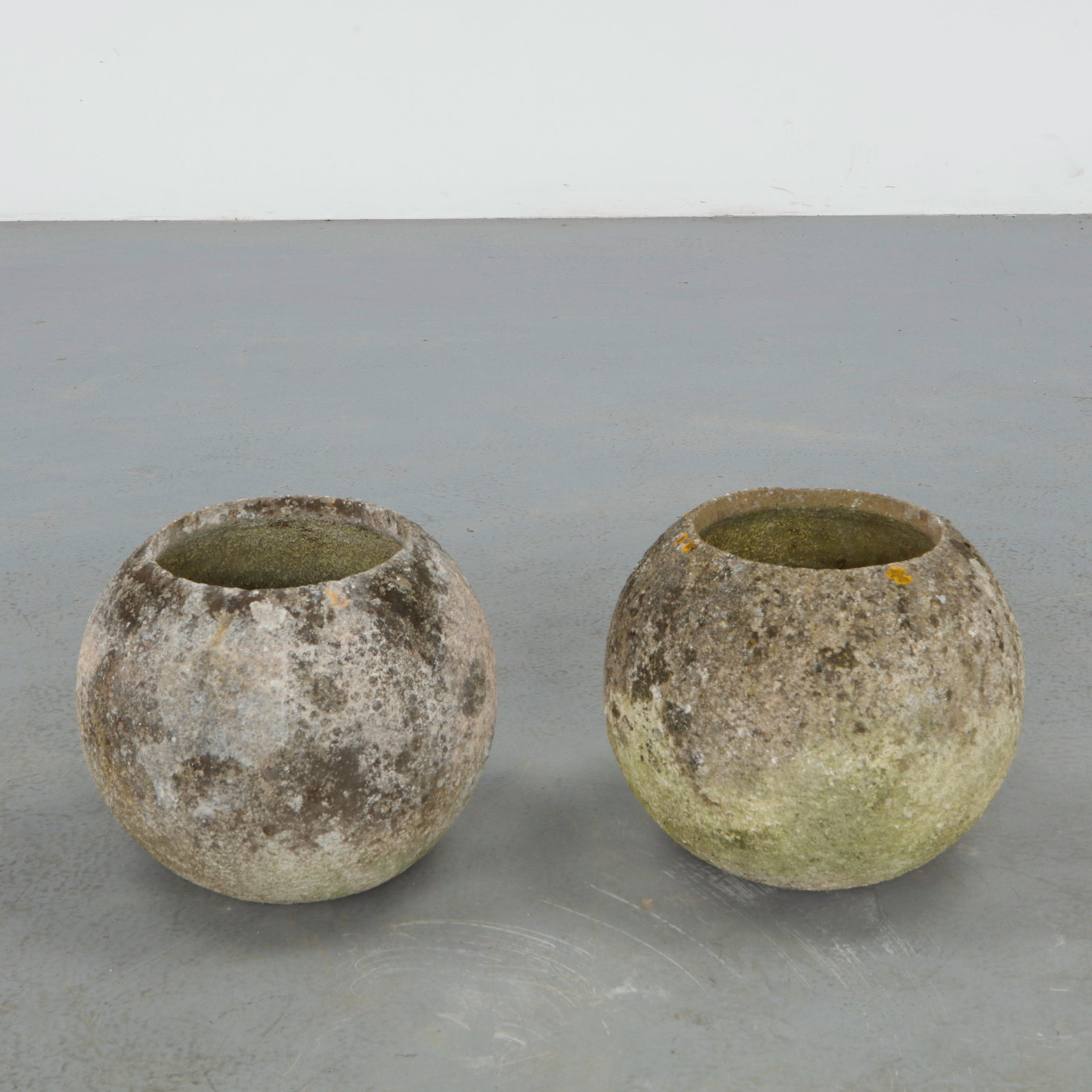 Grandon Fres, Pair of Spherical Planters, 1960s: Pair of classic sperical shaped planters by Grandon Fres. Each displays subtle variations in surface texture and tone from age. Height: 11.5 in. Diameter: 12.5 in. Opening Diameter: 7.5 in.