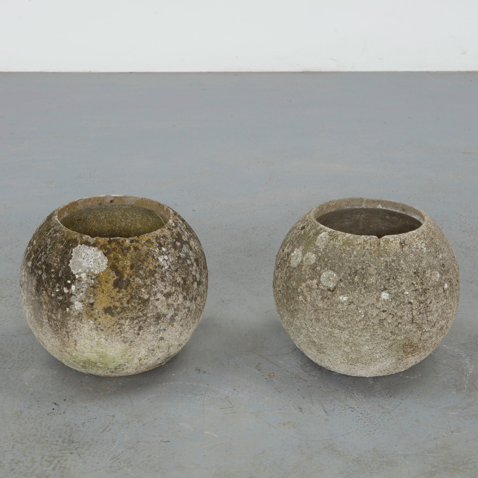 Grandon Fres, Pair of Spherical Planters, 1960s: Pair of classic spherical shaped planters by Grandon Fres. Each displays subtle variations in surface texture and tone from age. Height: 11.5 in. Diameter: 12.5 in. Opening Diameter: 7.5 in.