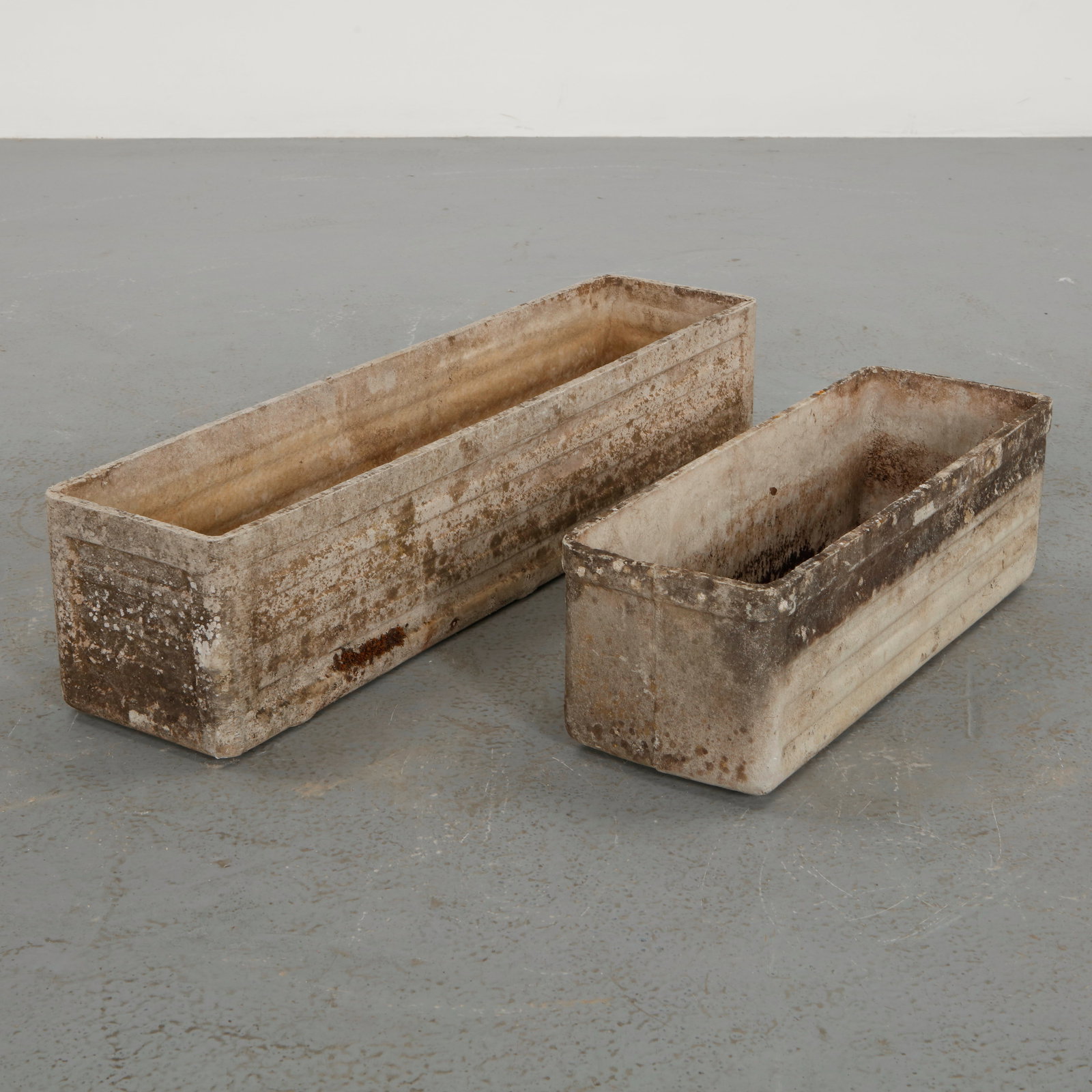 Willy Guhl, Pair of Rectangular Planters, 1960s: Classic rectangular Eternit planters designed by Willy Guhl. Timeless Swiss design with natural patina from outdoor use. Small: Height: 8 in. Length: 23.5 in. Width: 8.5 in. Long: Height: 8.5 in.