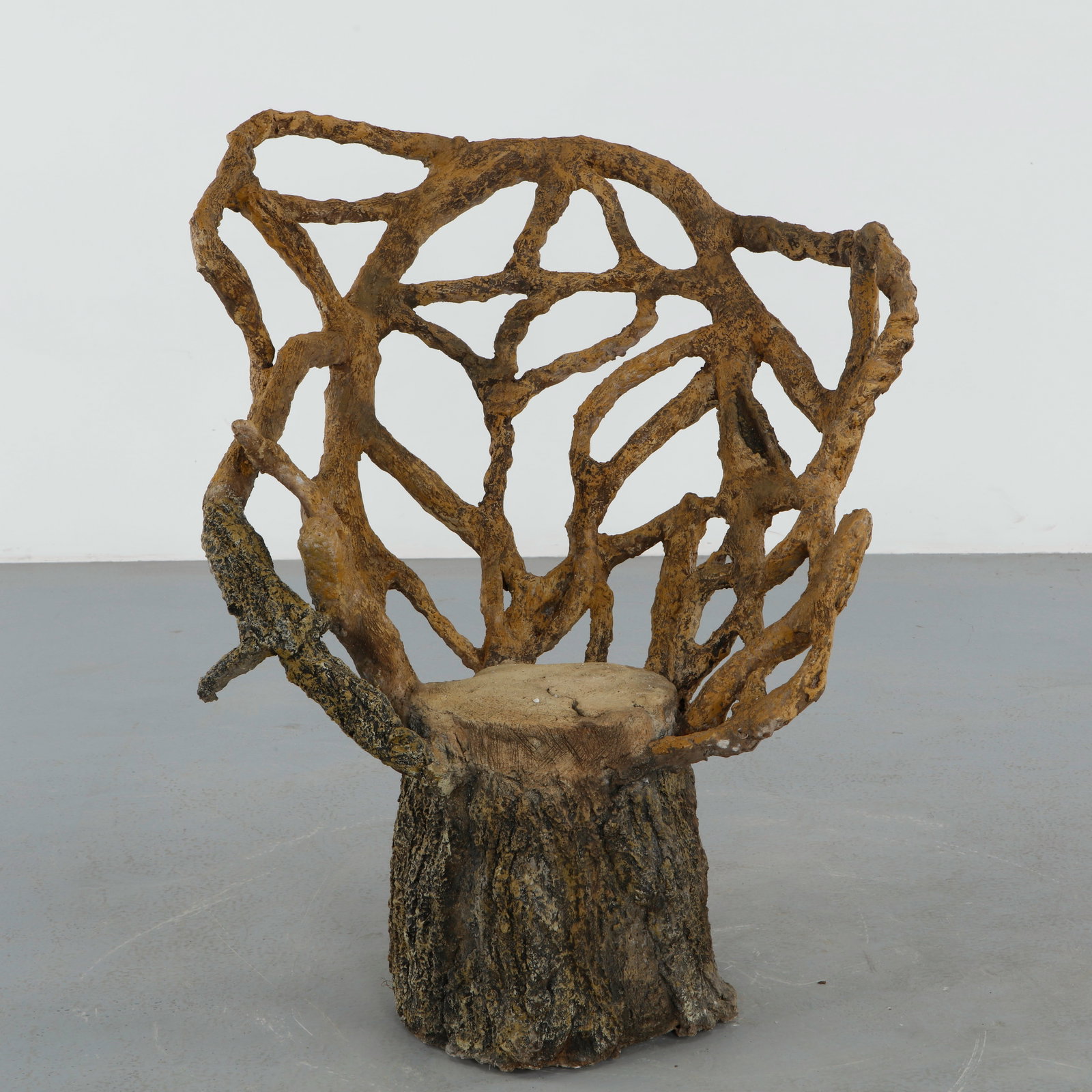 Faux Bois Sculptural Outdoor Chair, 1960s: Exceptional sculptural outdoor chair executed in faux bois concrete with an elaborate openwork backrest imitating intertwined branches. The expressive organic composition blurs the line between functi