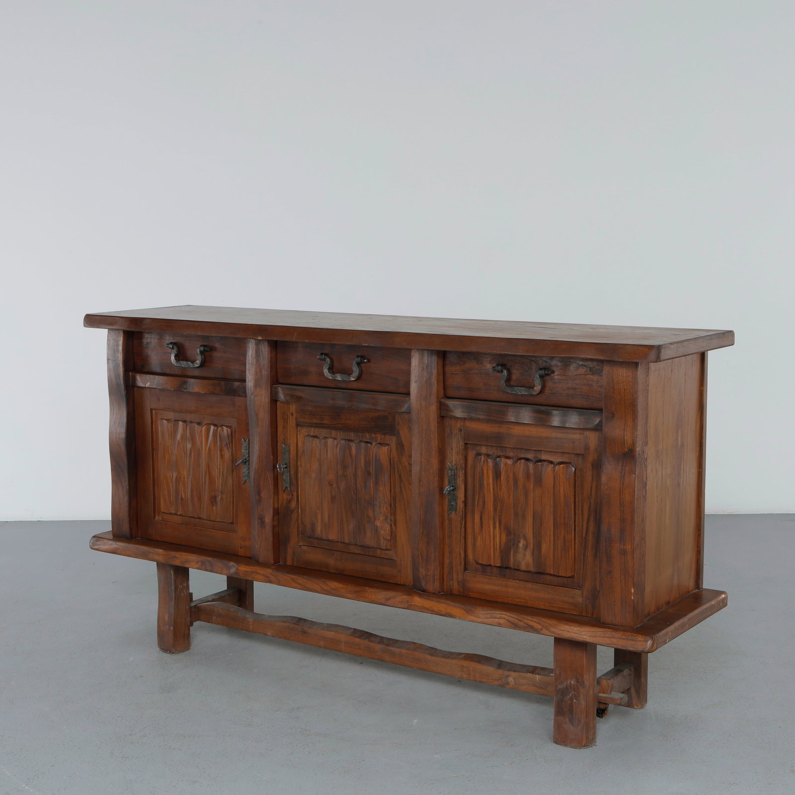 Olavi Hanninen For Mikko Nupponen, Brutalist Sculptural Sideboard, 1950s: Crafted in solid wood, this sideboard features deeply carved panels and bold geometric construction. The expressive surface treatment reflects Hanninen approach to material and form. A rare and highly