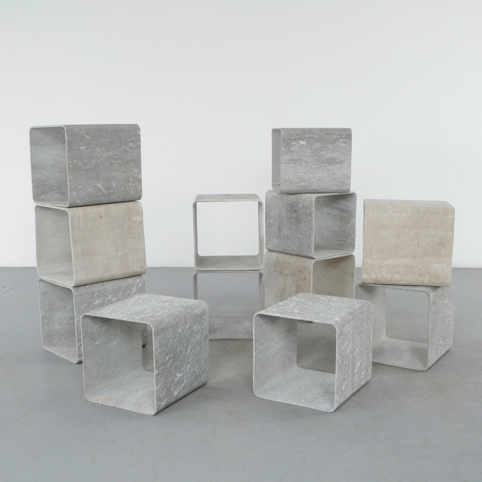 Willy Guhl, 12 Units Bookcase, 1960s: Executed in fiber cement, this rare set of twelve modular units by Willy Guhl combines sculptural simplicity with remarkable versatility. Designed for indoor or outdoor use, the elements may be stacke