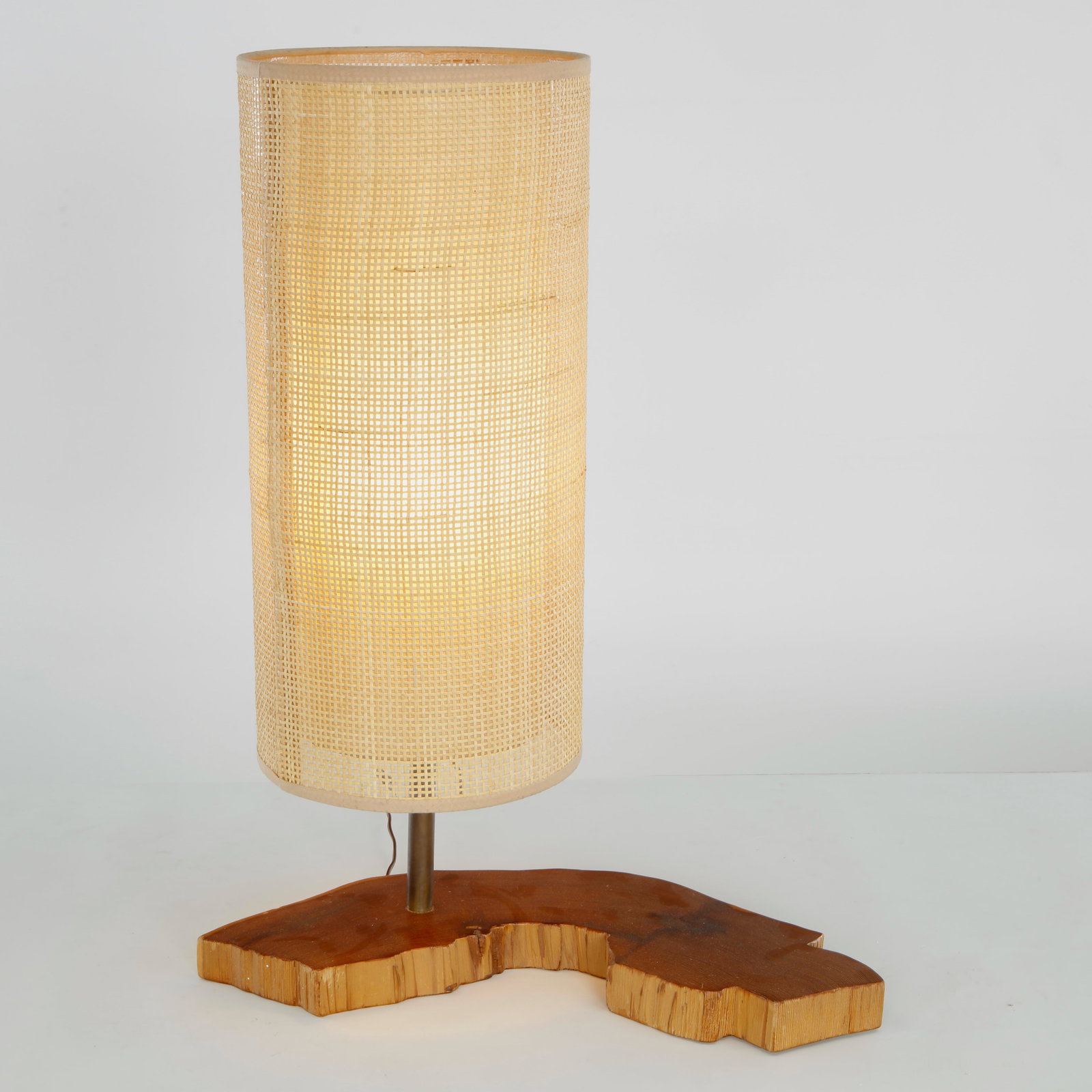 Brutalist Wood Table Lamp in the style of George Nakashima, 1960s: Featuring a live-edge inspired base and handcrafted character, this lamp celebrates the beauty of natural materials. Its sculptural presence reflects the enduring influence of American studio