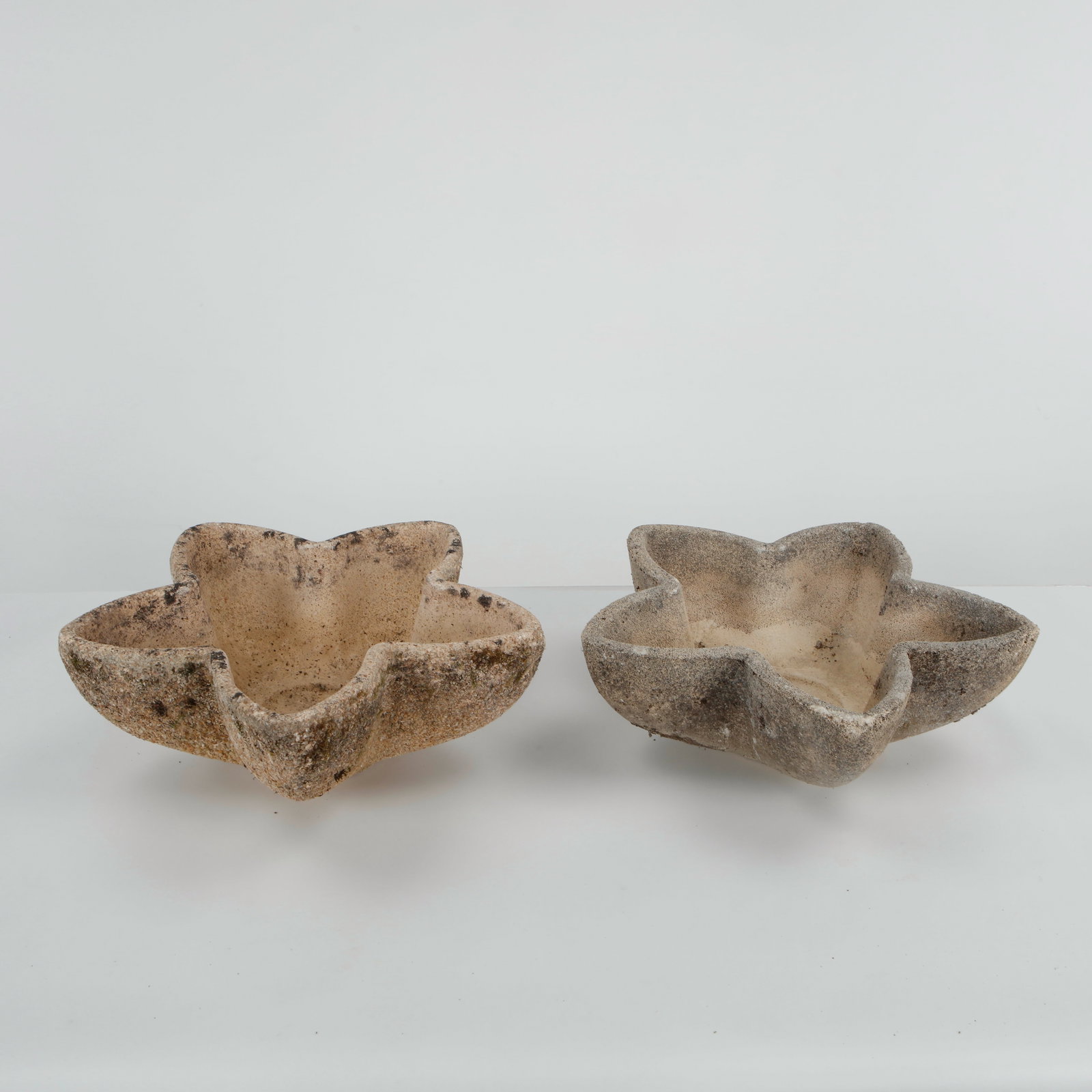 Pair of Limestone Star Planters, 1960s: Vibrant pair of star-shaped cement planters. A standout mid-century garden accent from the 1960s. Height: 8 in. Length: 21 in. Width: 17 in.