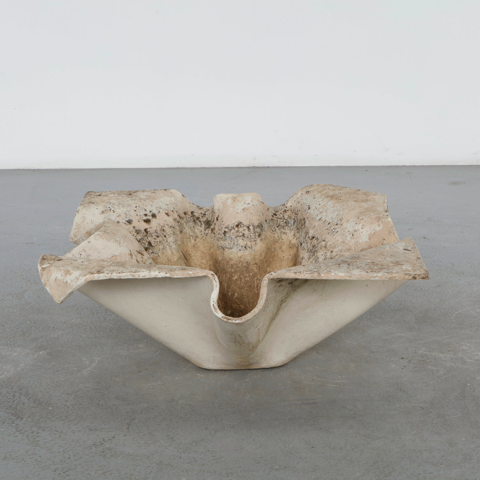 Willy Guhl, Large Elephant Ear Planter, 1960s: Large Elephant Ear planter, also known as handkerchief planter, by Willy Guhl for Eternit, Switzerland circa 1960. Factory-drilled drainage holes. Wonderful patina. Width: 35 in. Length: 35 in. Height