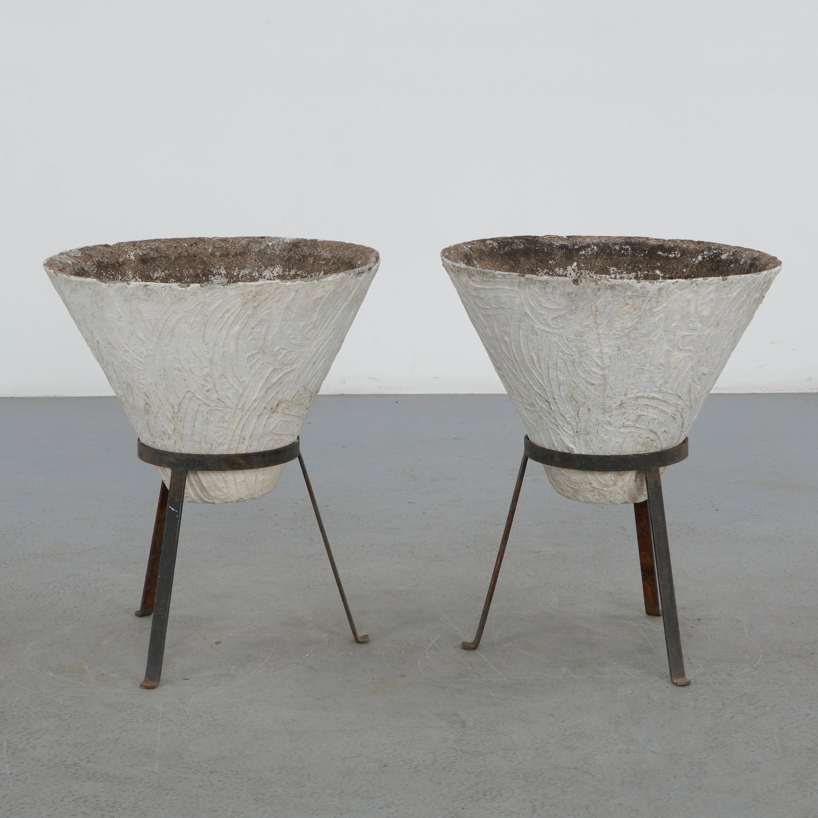 Grandon Fres, Pair of Conical Planters on Stands, 1960s: A striking pair of conical fiber cement planters by Grandon Fres, raised on elegant steel stands. Their sculptural silhouette and textured surfaces create a refined balance between architectural form 