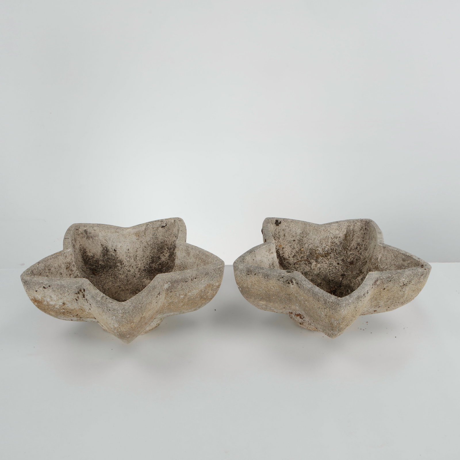 Pair of Limestone Star Planters, 1960s: Vibrant pair of star-shaped cement planters. A standout mid-century garden accent from the 1960s. Height: 8 in. Length: 21 in. Width: 17 in.