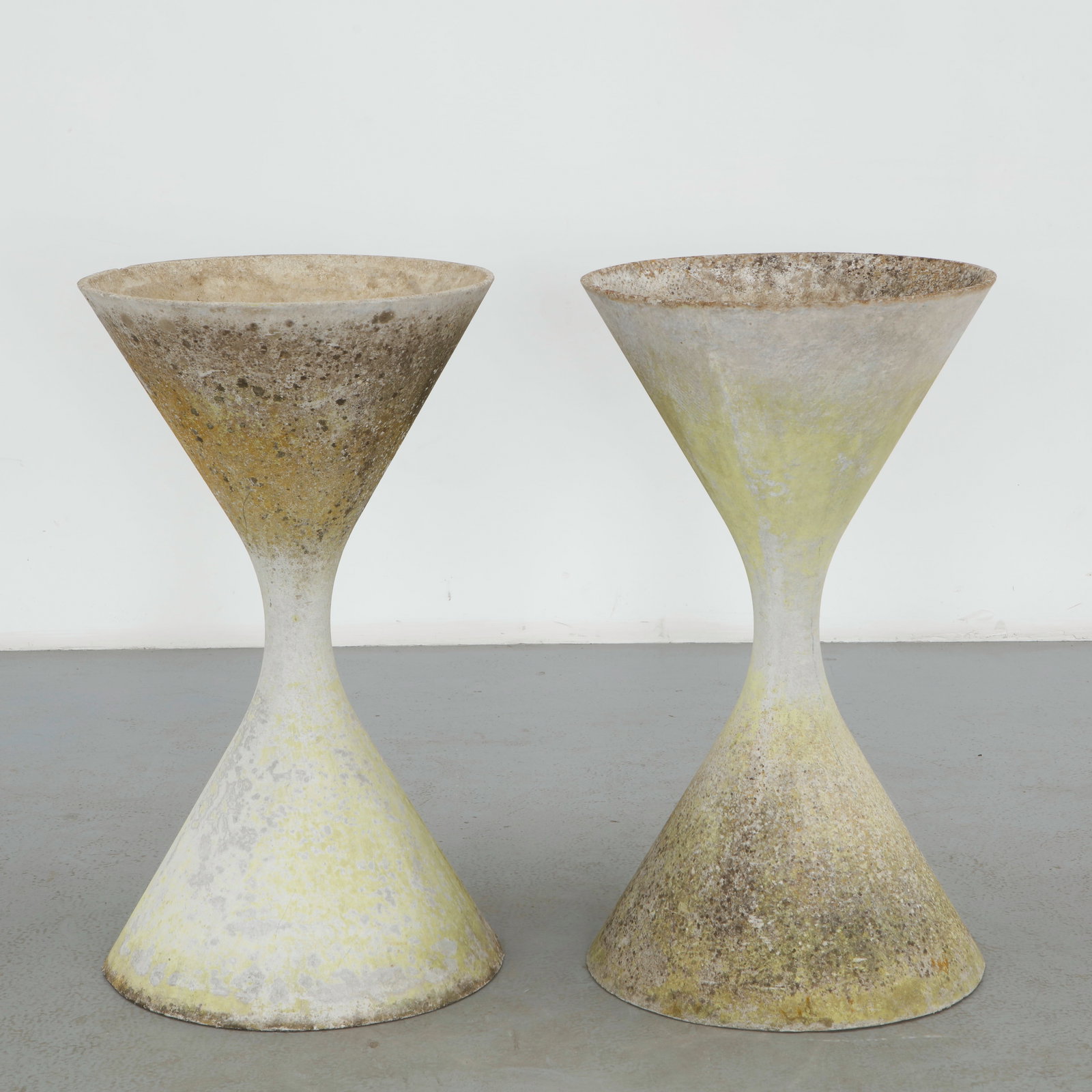 Willy Guhl, Pair of Large Diabolo Planters, 1960s: Pair of Willy Guhl large diabolo planters manufactured by Eternit, Switzerland. Height: 38 in. Diameter: 21.5 in.