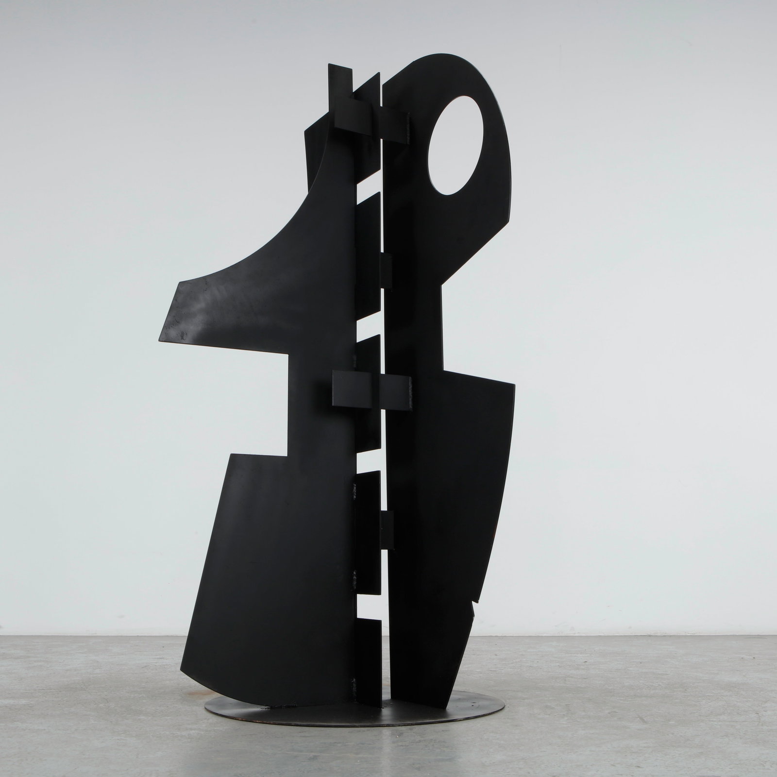 Philippe Makhloof, Abstract Metal Sculpture, 1980s: A monumental abstract sculpture executed in welded steel, composed of intersecting geometric planes finished in a deep matte black patina. Balancing architectural rigor with expressive asymmetry, the 