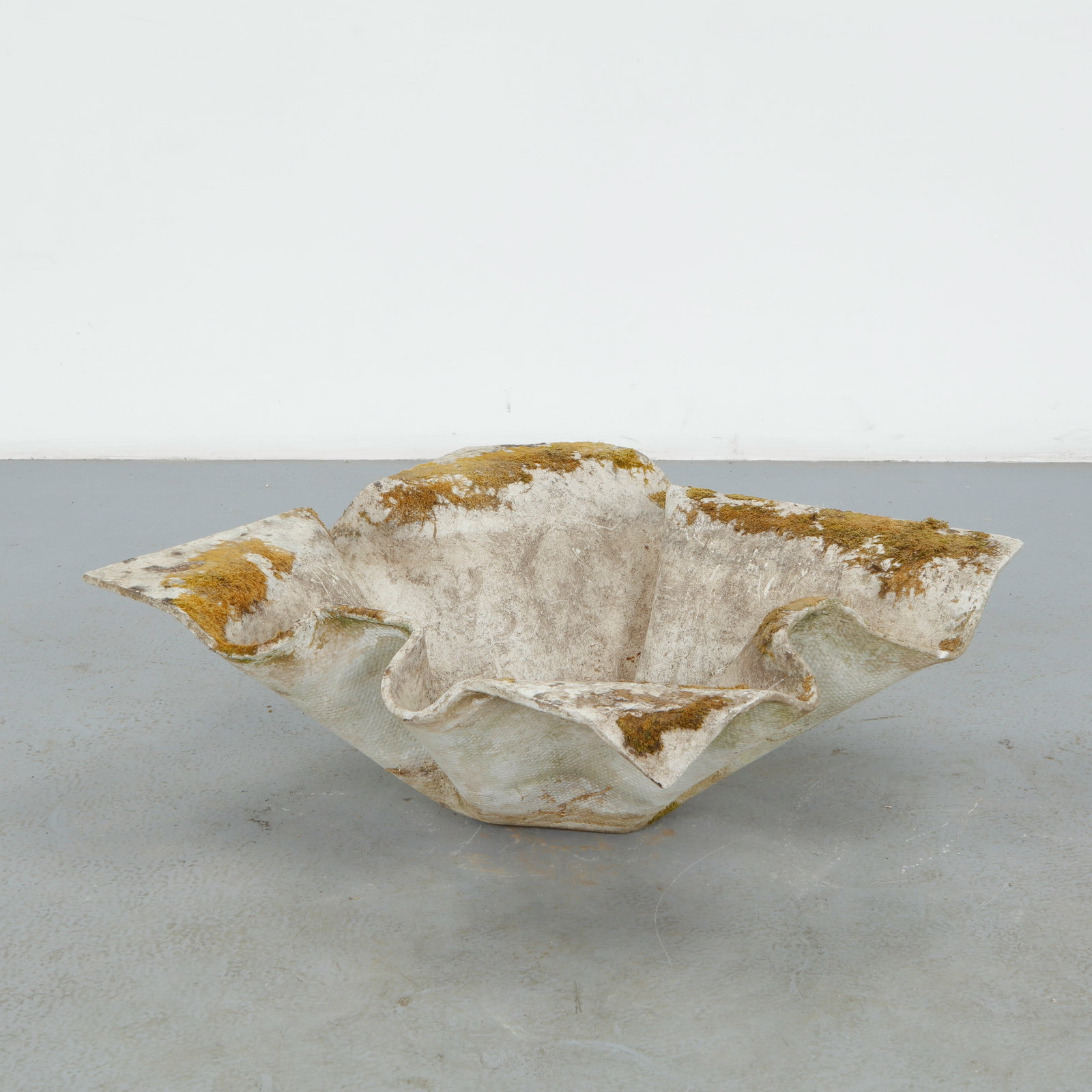 Willy Guhl, Large Elephant Ear Planter, 1960s: Large Elephant Ear planter, also known as handkerchief planter, by Willy Guhl for Eternit, Switzerland circa 1960. Factory-drilled drainage holes. Wonderful patina. Height: 11.5 in. Length: 32 in. Wid