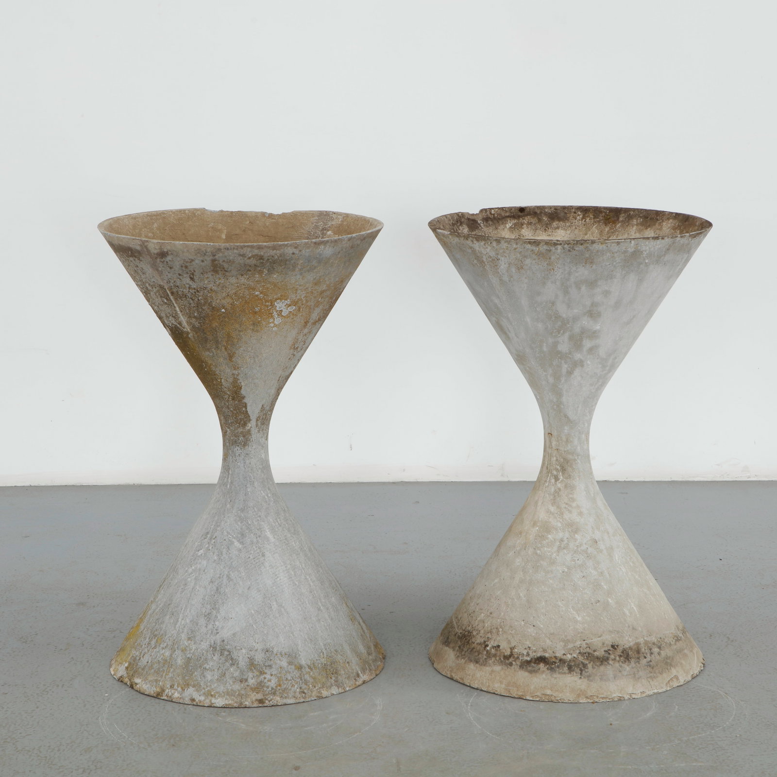Willy Guhl, Pair of Large Diabolo Planters, 1960s: Pair of Willy Guhl large diabolo planters manufactured by Eternit, Switzerland. Height: 38 in. Diameter: 21.5 in.
