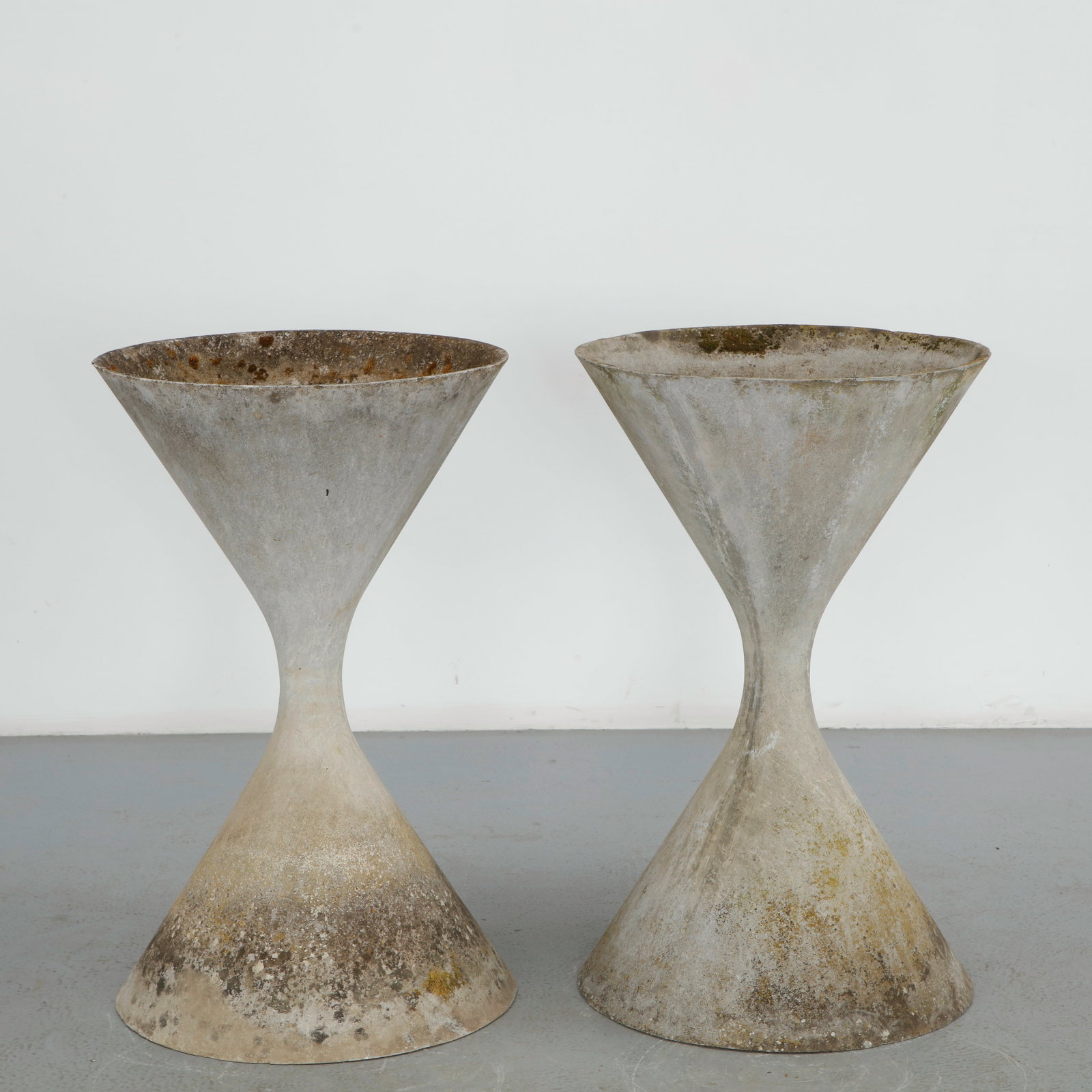Willy Guhl, Pair of Large Diabolo Planters, 1960s: Pair of Willy Guhl large diabolo planters manufactured by Eternit, Switzerland. Height: 38 in. Diameter: 21.5 in.