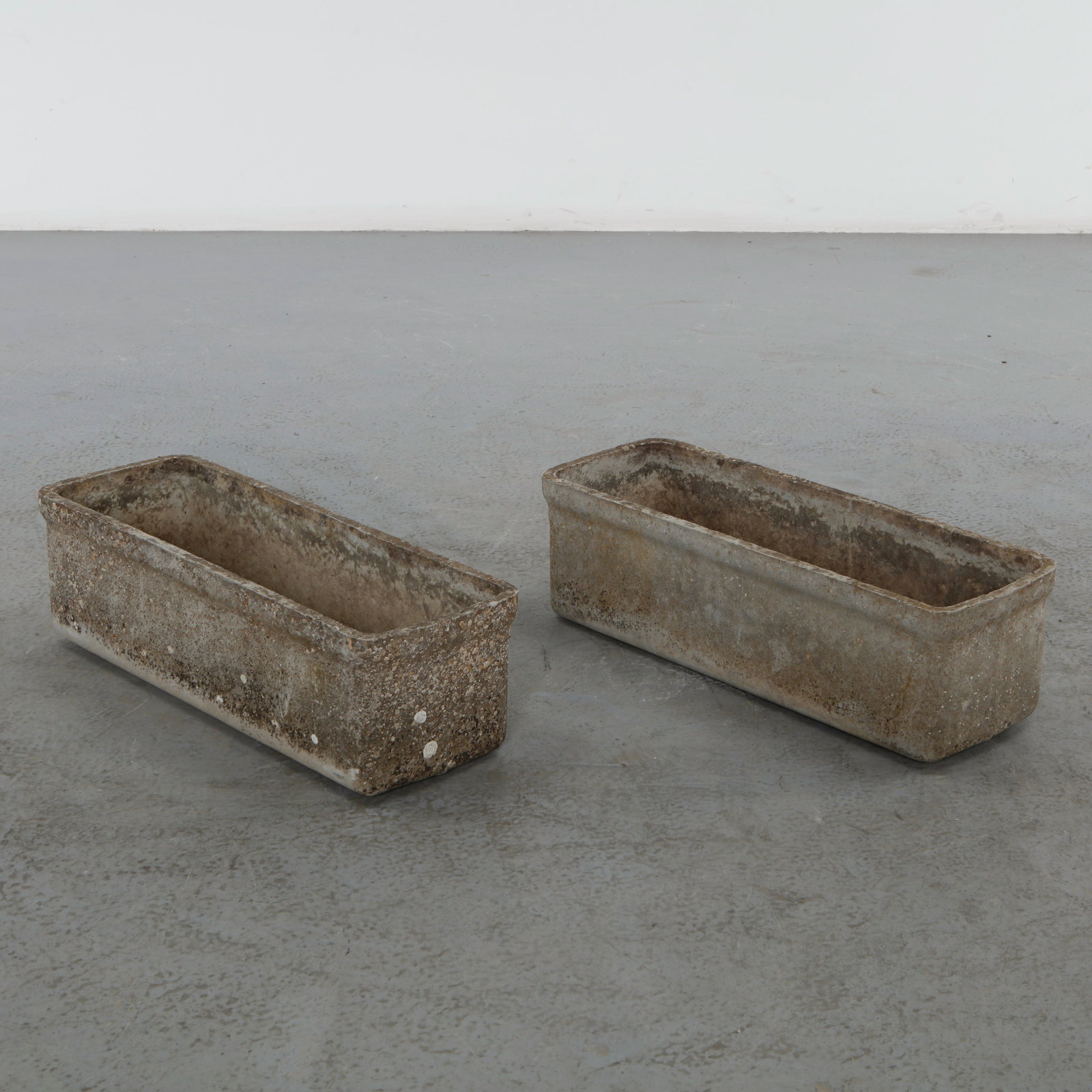 Willy Guhl, Pair of Rectangular Planters, 1960s: Classic rectangular Eternit planters designed by Willy Guhl. Timeless Swiss design with natural patina from outdoor use. Height: 7 in. Length: 23 in. Width: 8 in.