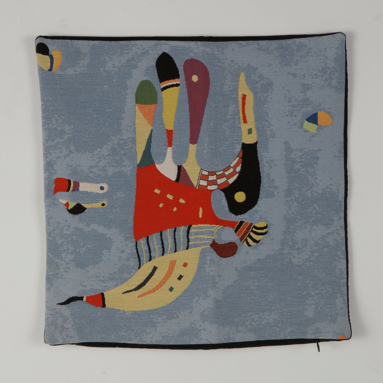 Wassily Kandinsky, Pillow Cover for the Pompidou Center: Decorative woven pillow cover produced for the Centre Pompidou, featuring one of Wassily Kandinsky celebrated abstract compositions. Richly woven with vibrant colors and intricate detailing, it transl