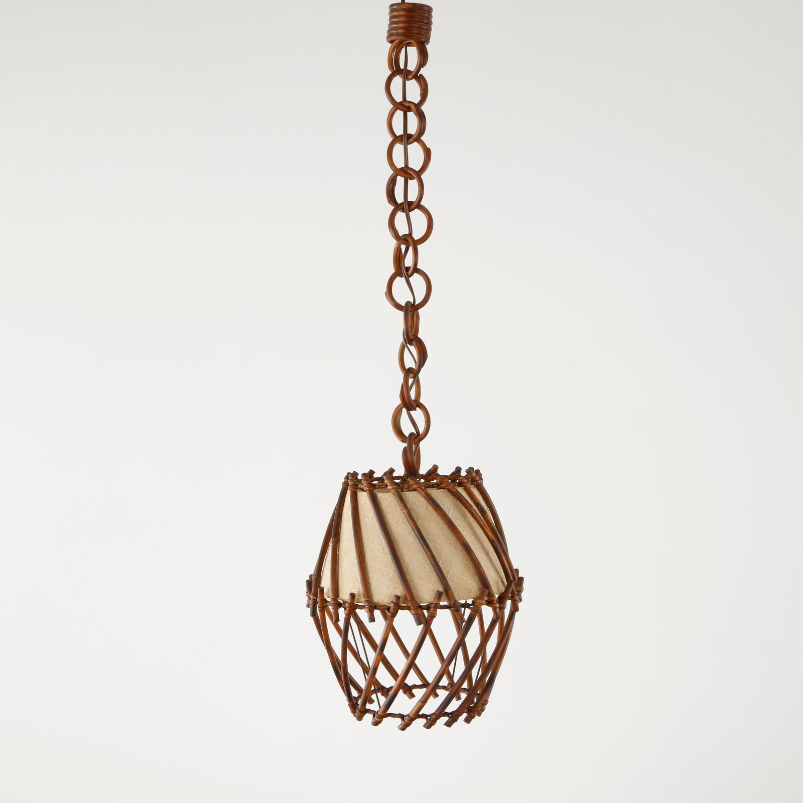 Louis Sognot, Bamboo Hanging Lantern, France, 1950s: A suspended lantern featuring an intricate bamboo framework surrounding a parchment diffuser, completed with a decorative bamboo chain. A rare example of Sognot organic lighting designs inspired by