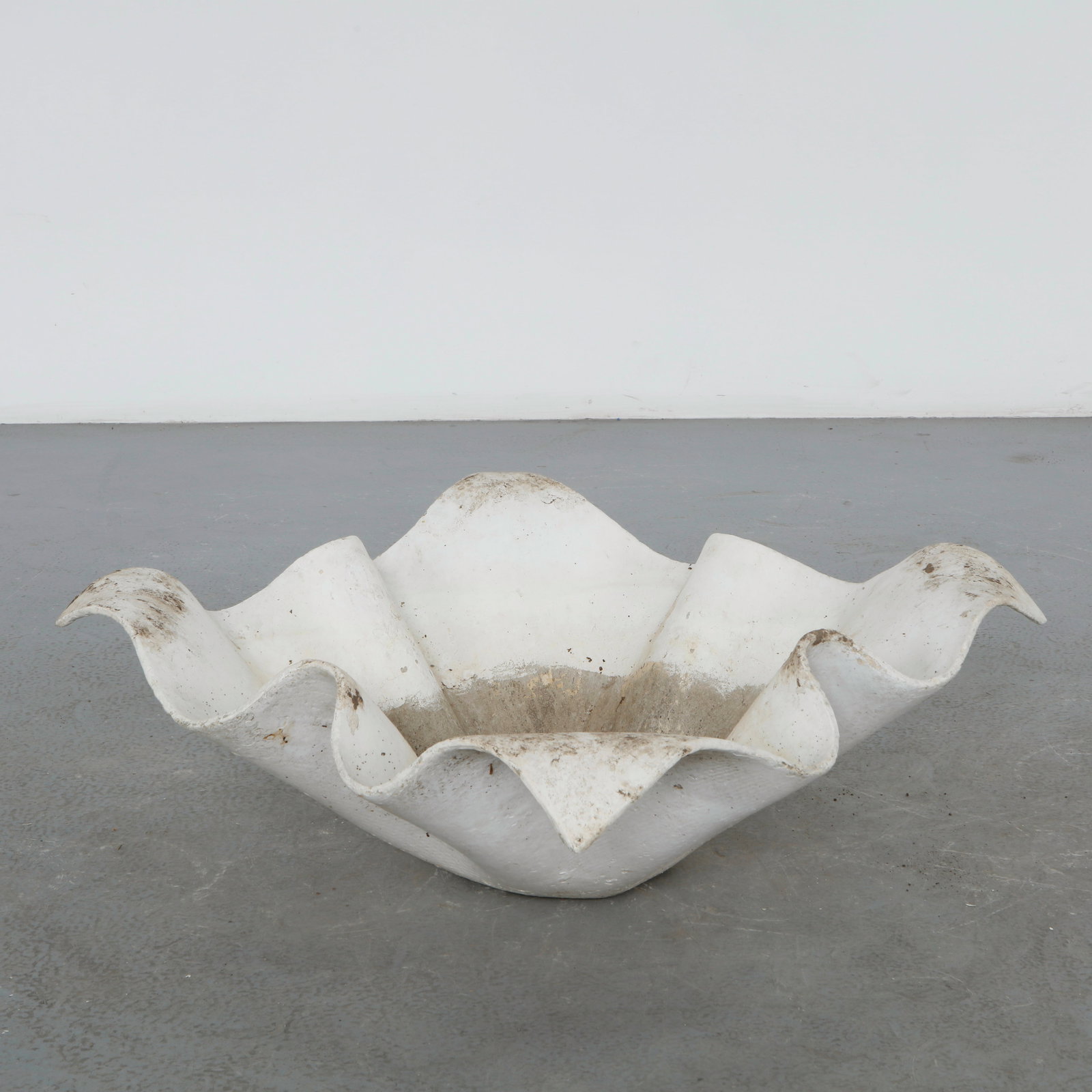 Willy Guhl, Large Elephant Ear Planter, 1960s: Large Elephant Ear planter, also known as handkerchief planter, by Willy Guhl for Eternit, Switzerland circa 1960. Factory-drilled drainage holes. Wonderful patina. Width: 35 in. Length: 35 in.