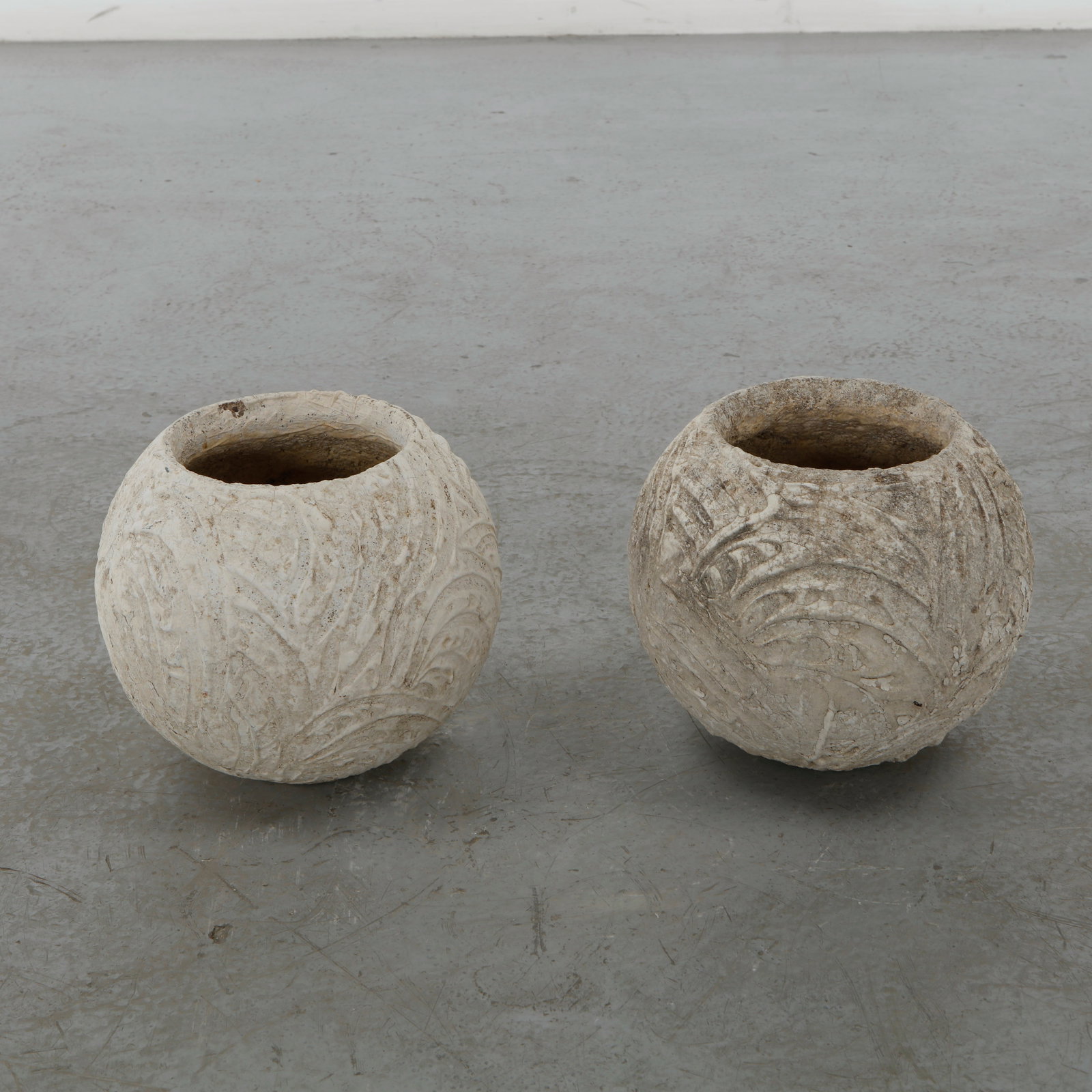 Grandon Fres, Pair of Spherical Planters, 1960s: Pair of classic spherical shaped planters by Grandon Fres. Each displays subtle variations in surface texture and tone from age. Height: 11.5 in. Diameter: 12.5 in. Opening Diameter: 7.5 in.