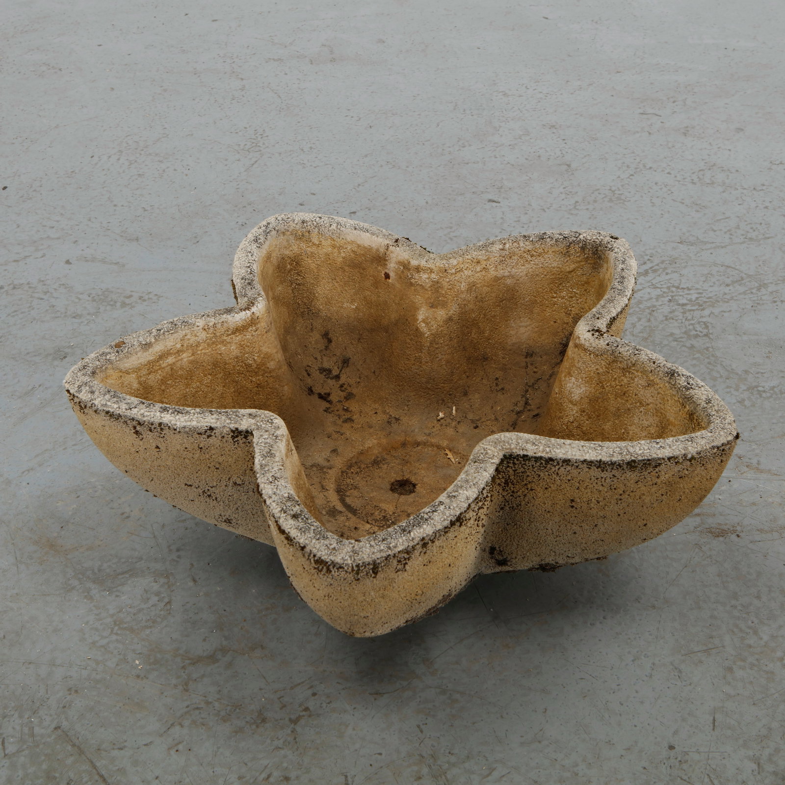 Grandon Fres, Cast Stone Star Planter, 1960s: A star form planter in cast concrete, its undulating five pointed silhouette offering a sculptural interpretation of the traditional garden planter. A striking example of mid century outdoor design, f