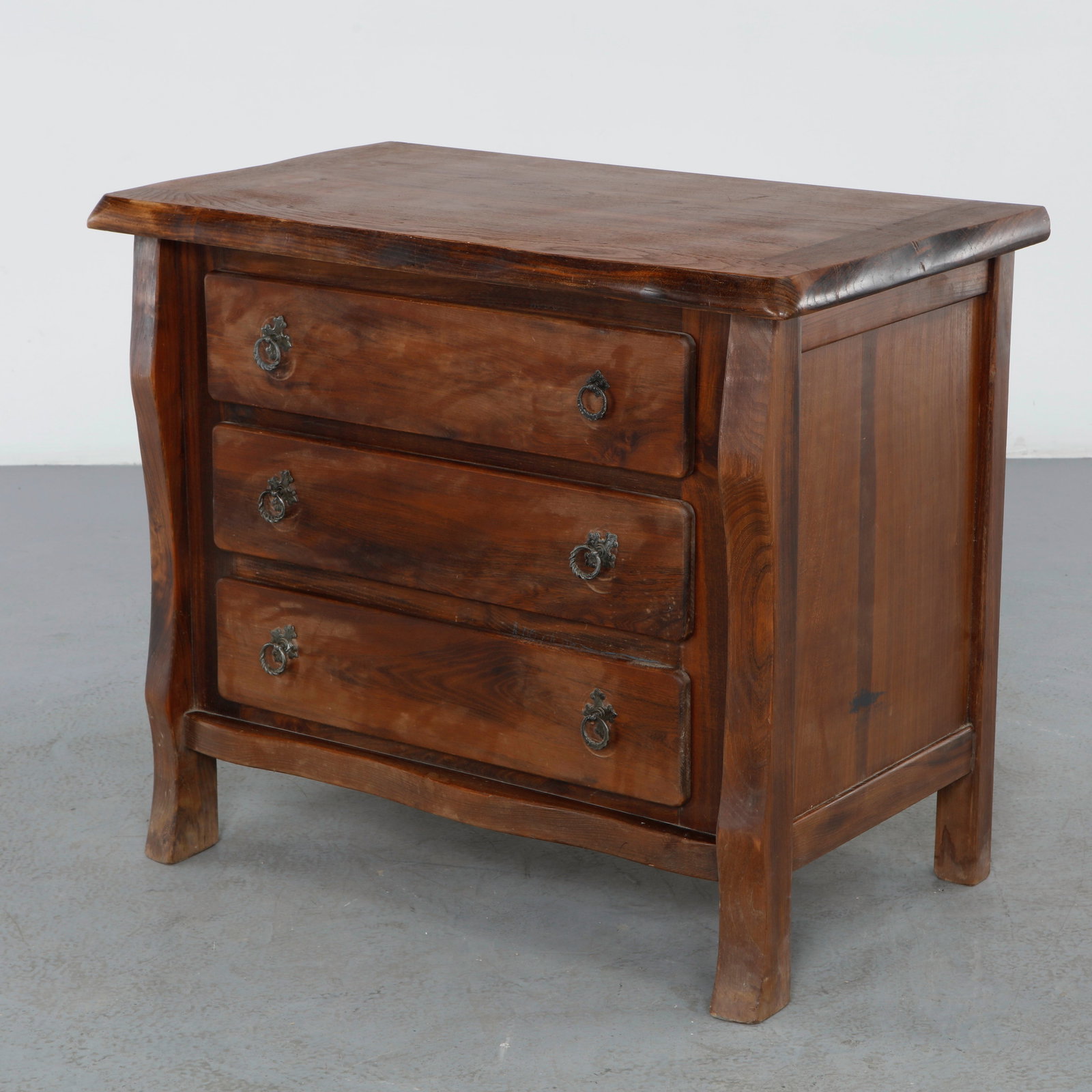 Olavi Hanninen, Brutalist Three-Drawer Chest, Finland, 1950s: Crafted in solid wood, this sculptural three-drawer chest reflects Olavi Hanninen distinctive blend of Scandinavian Modernism and Brutalist design. Its expressive grain, hand-shaped silhouette, and or