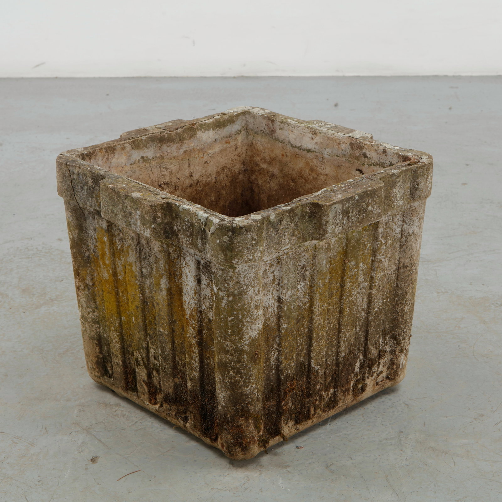 Willy Guhl, Square Planter, 1960s: A square planter designed by Willy Guhl, executed in fiber cement with the designer signature architectural lines and integrated side handles. Its restrained geometry and naturally weathered surface