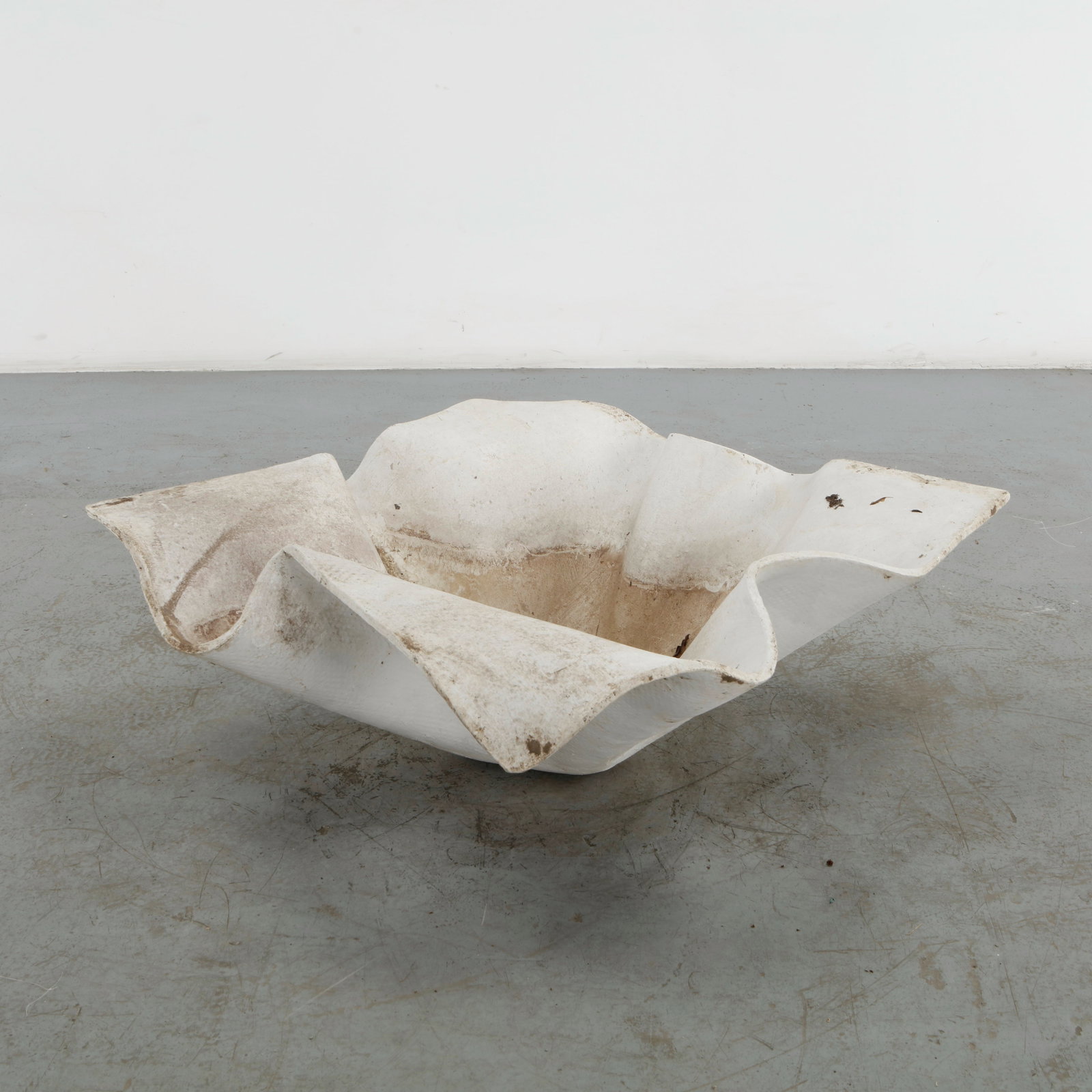 Willy Guhl, Large Elephant Ear, 1960s: Large Elephant Ear planter, also known as handkerchief planter, by Willy Guhl for Eternit, Switzerland circa 1960. Factory-drilled drainage holes. Wonderful patina. Width: 35 in. Length: 35 in.
