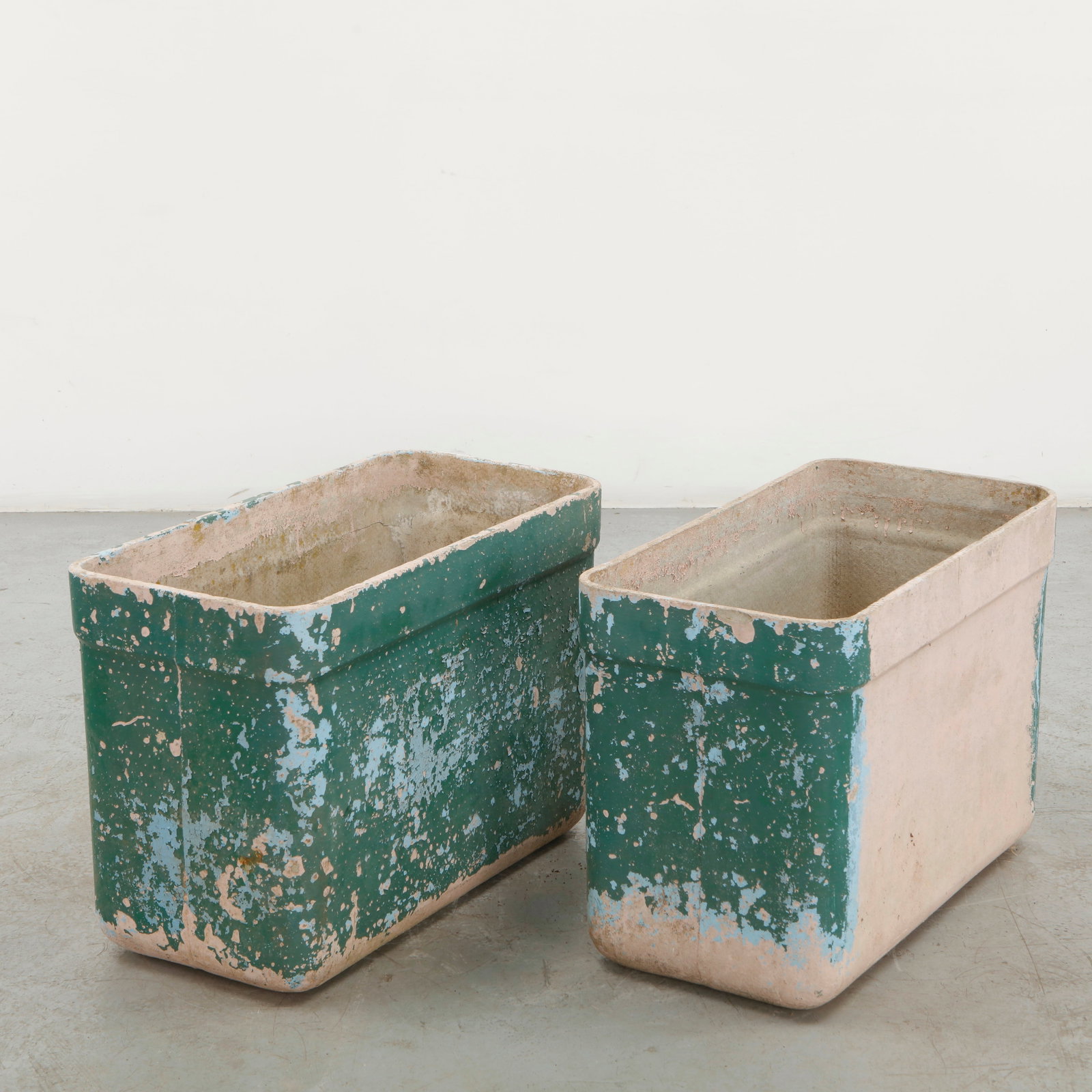 Willy Guhl, Pair of Tall Rectangular Planters, 1960s: A rare pair of tall rectangular planters by Willy Guhl, executed in molded concrete with softly rounded corners and a substantial architectural profile. The heavily weathered green and blue painted