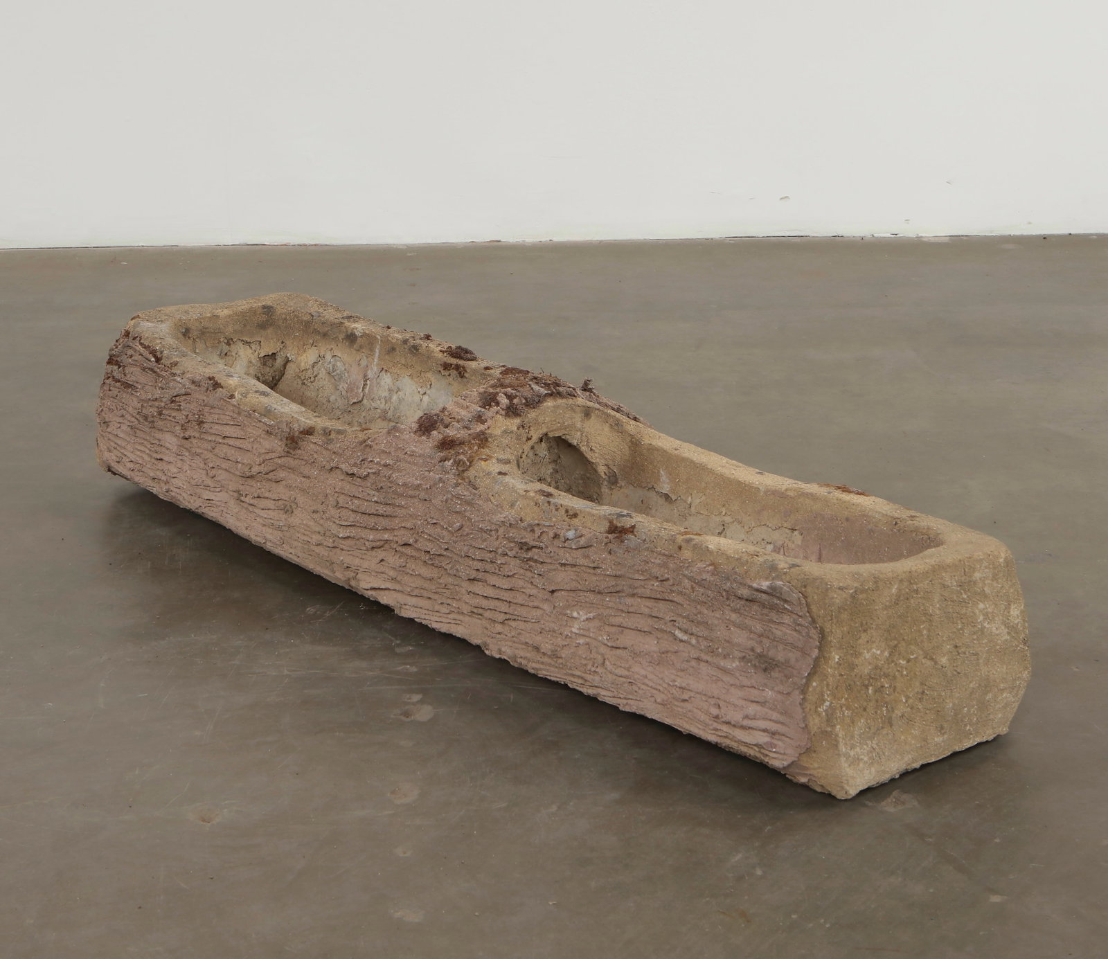 Monumental 5-Foot Faux Bois Planter, 1960s: Large-scale faux-Bois planter rendered with deeply carved bark textures and an organic, irregular form. Its impressive scale makes it a statement piece within any garden composition. Height: 15 in. Le