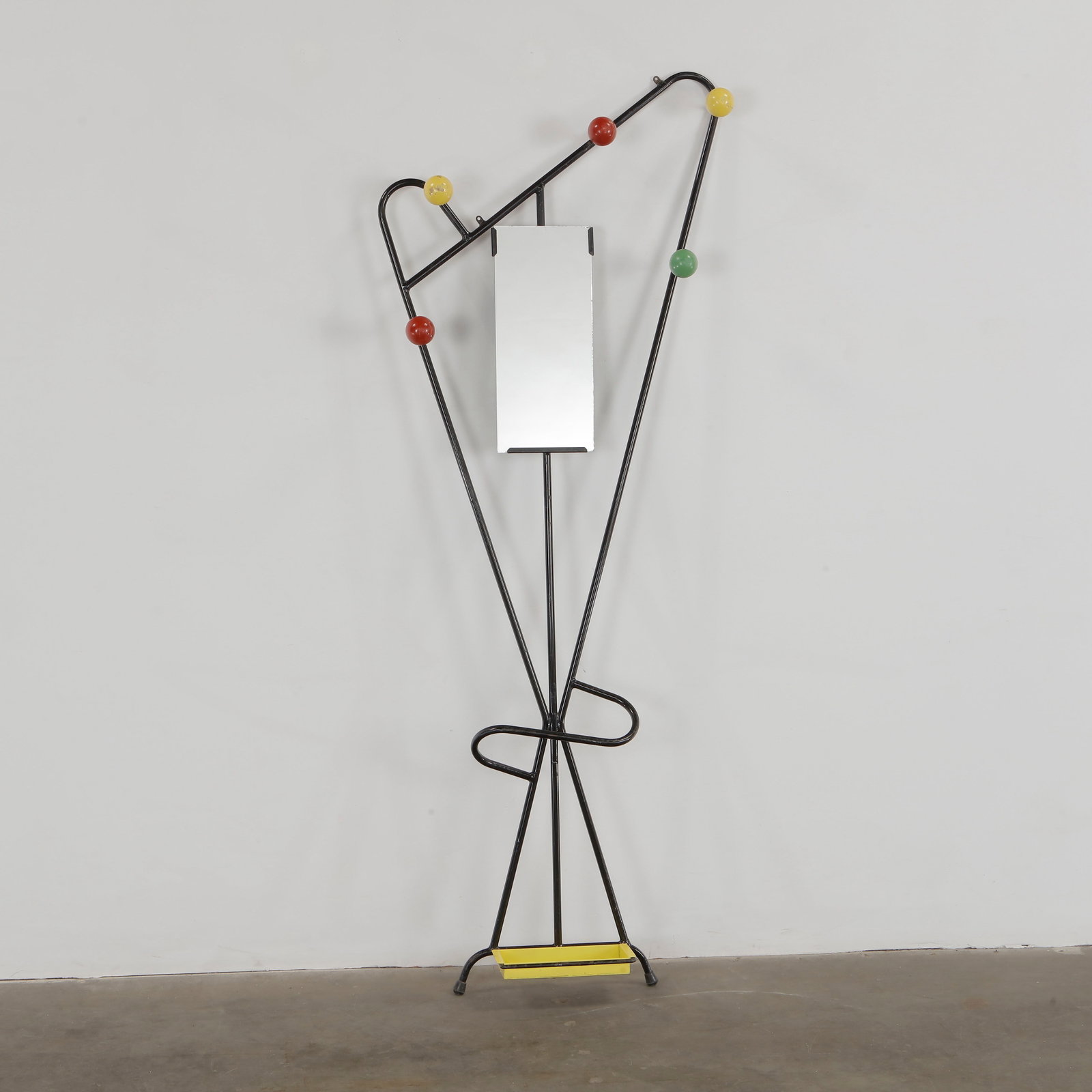 Roger Feraud, Hall Stand, 1950s: Iconic mid-century hall stand in lacquered metal with colorful spherical hooks. A playful sculptural piece that combines utility with graphic impact. Height: 71 in. Length: 23 in. Width: 5 in.