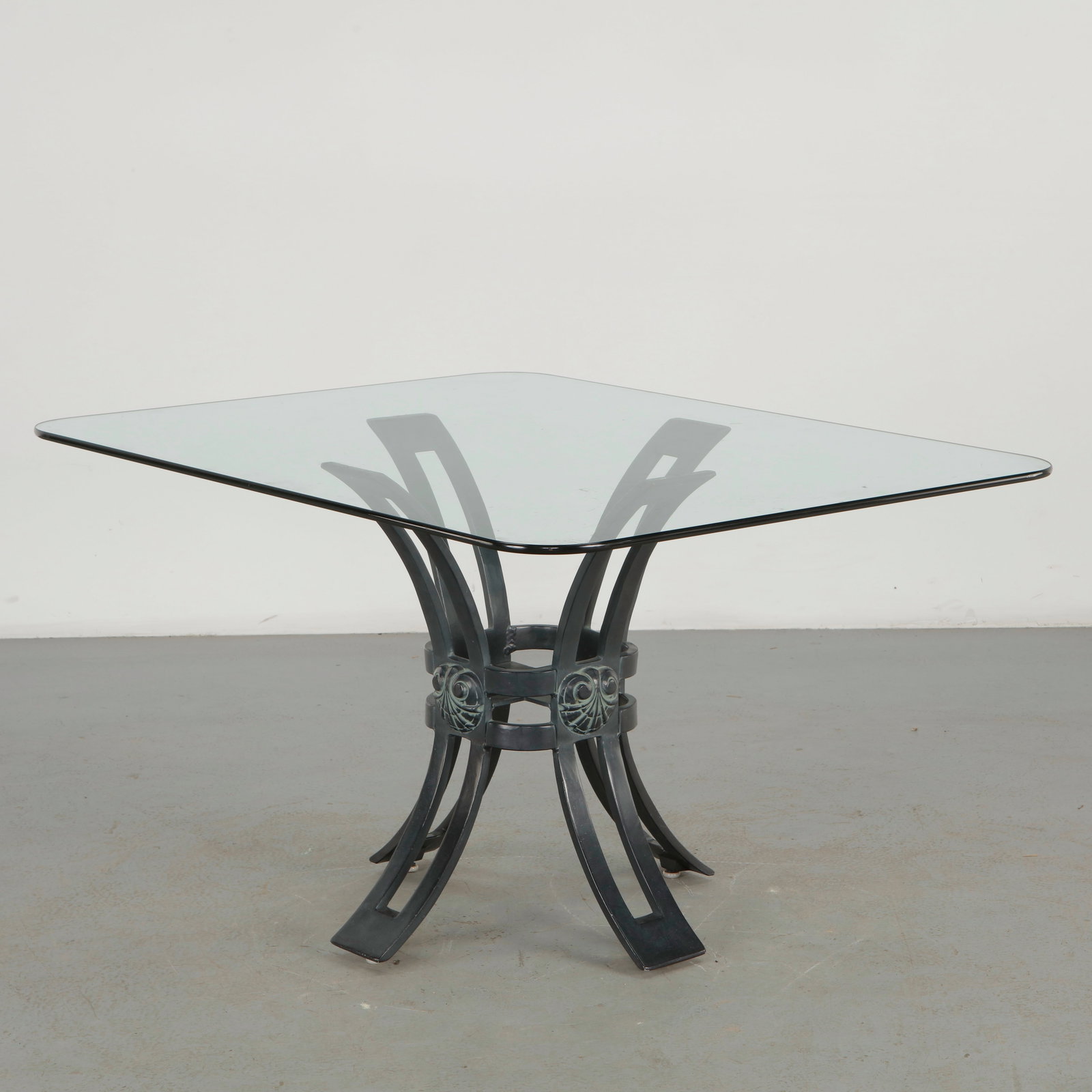 Brown Jordan, Venetian Grotto Aluminum Dining Table, 1970s: A striking Venetian Grotto dining table by Brown Jordan, distinguished by a sculptural aluminum base of gracefully curved supports and ornamental medallion detailing. Topped with a substantial rectang
