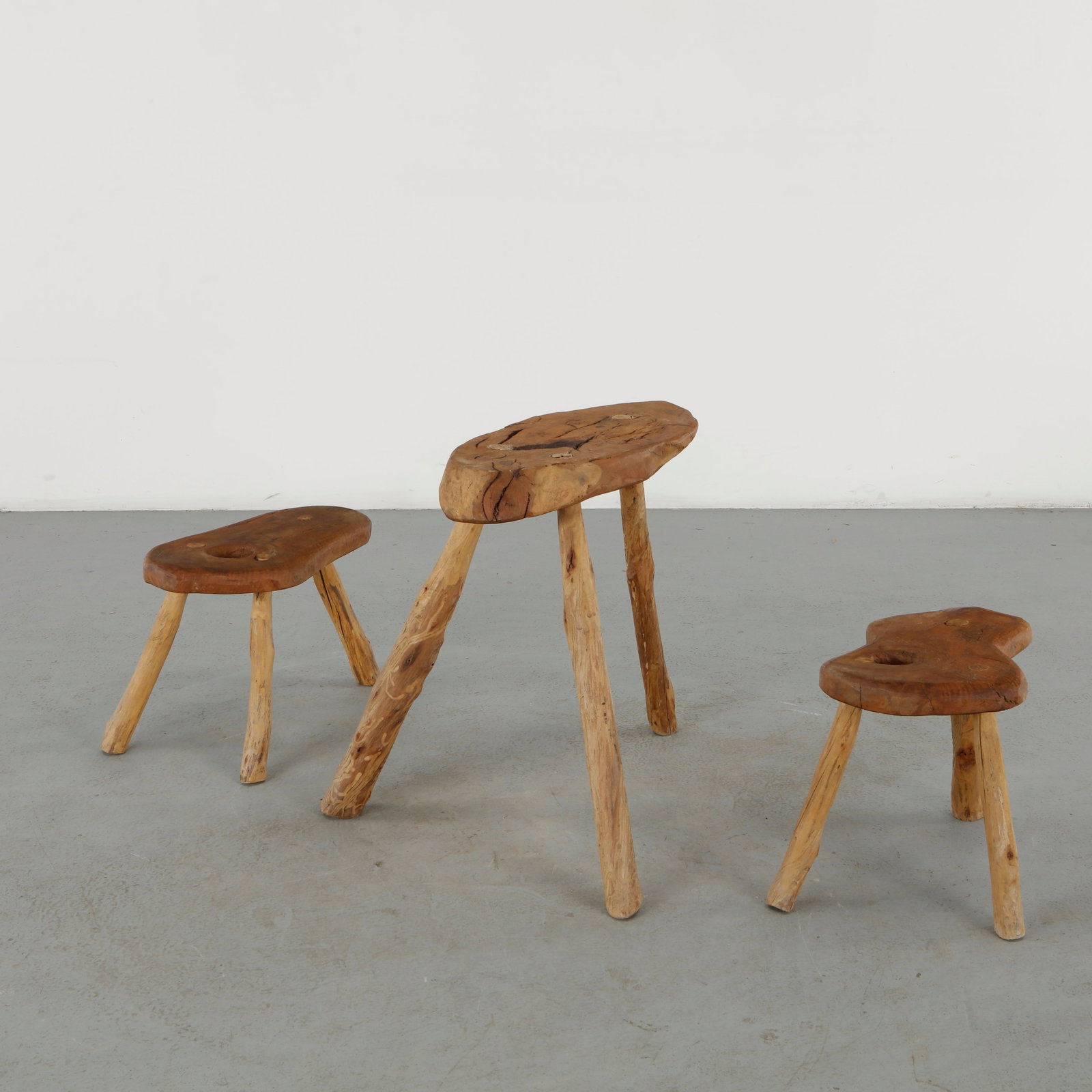 Root Wood Table with Stools, 1960s: A striking rustic ensemble comprising an organically formed rootwood table accompanied by matching stools. Retaining the irregular contours of branches and natural timber, the group possesses a distin
