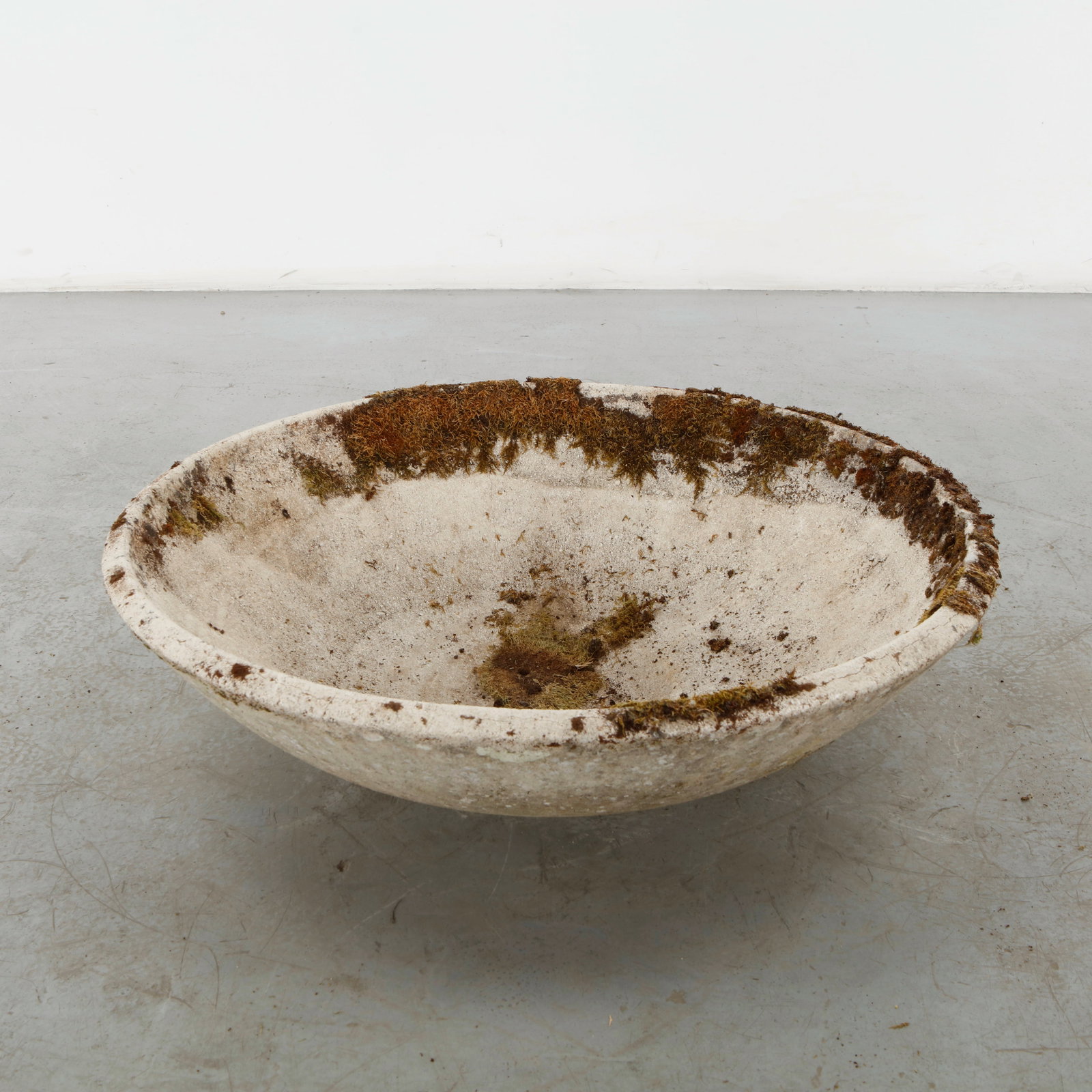 Large Cast Stone Bowl Planter, 1960s: A substantial cast stone bowl planter with a broad, softly rounded profile and finely weathered surface. Its generous proportions and restrained form lend a monumental quality to this utilitarian gard