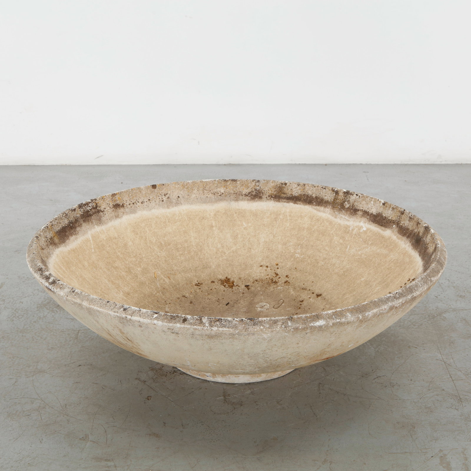 Monumental Cast Stone Bowl Planter, 1960s: A substantial cast stone bowl planter with a broad, softly rounded profile and finely weathered surface. Its generous proportions and restrained form lend a monumental quality to this utilitarian gard